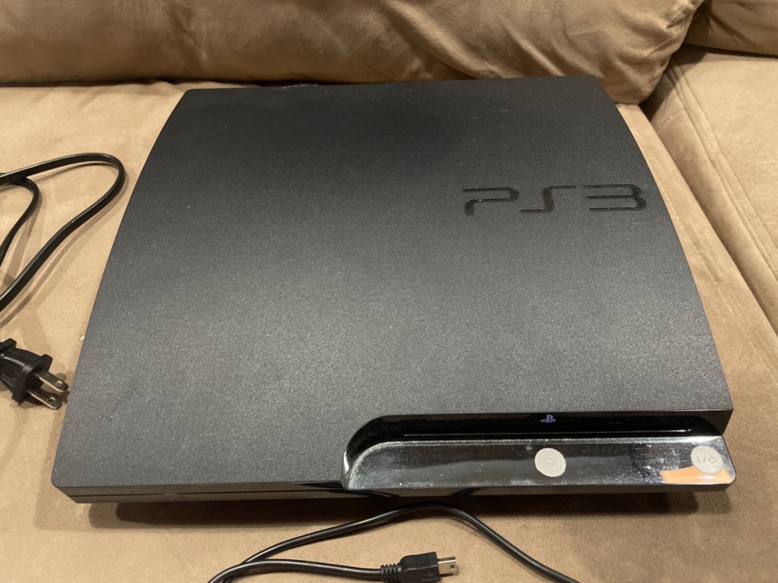 PlayStation 3 console with all necessary cords and 2 controllers