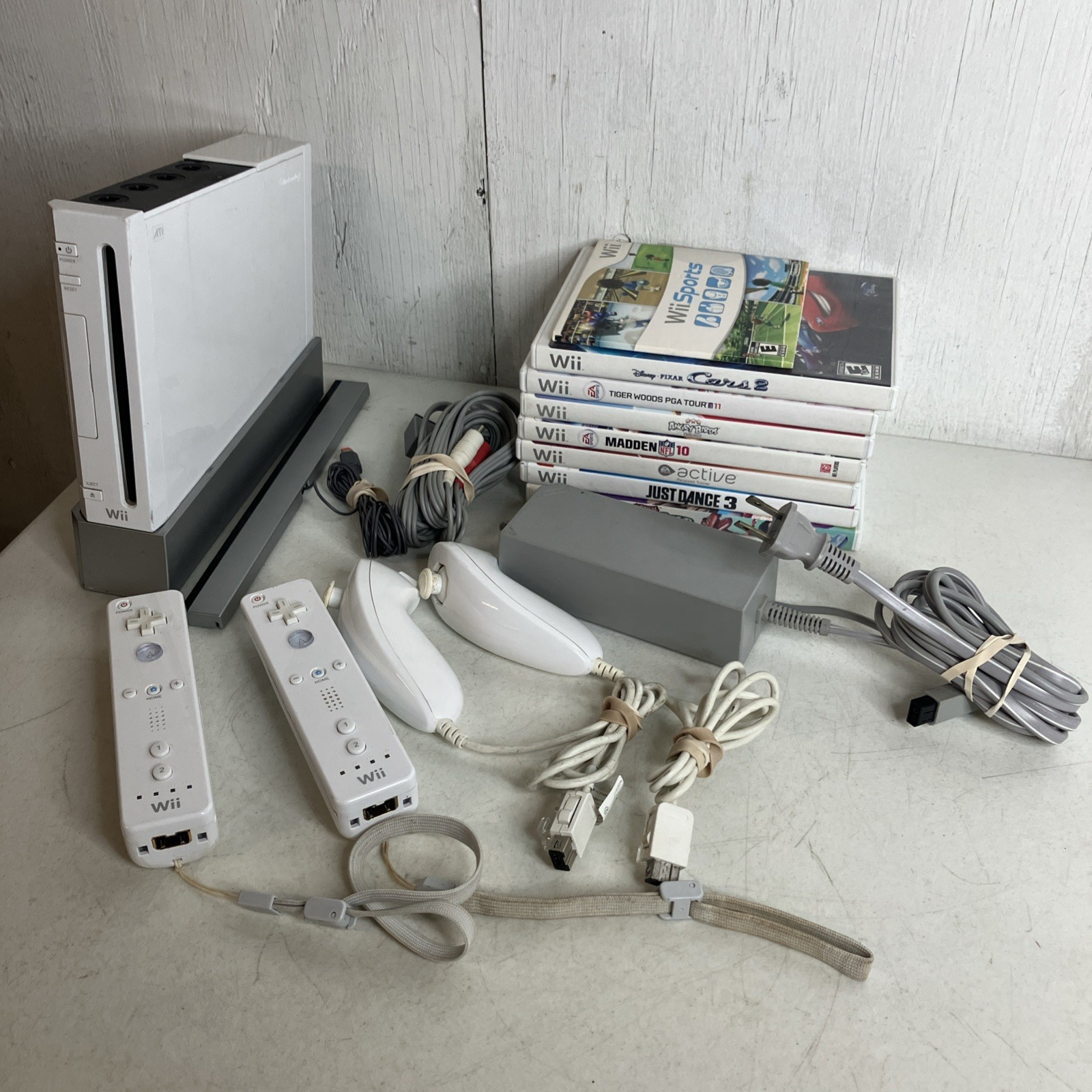 Nintendo Wii Bundle, 2 Controllers, 8 Games Wii Sports Cars 2 Angry Birds Golf
