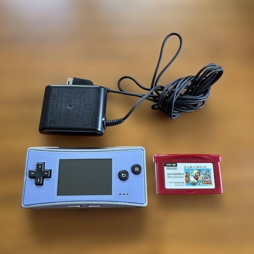 Nintendo Game Boy Micro Handheld Console with AC Adapter & Super Mario Bros