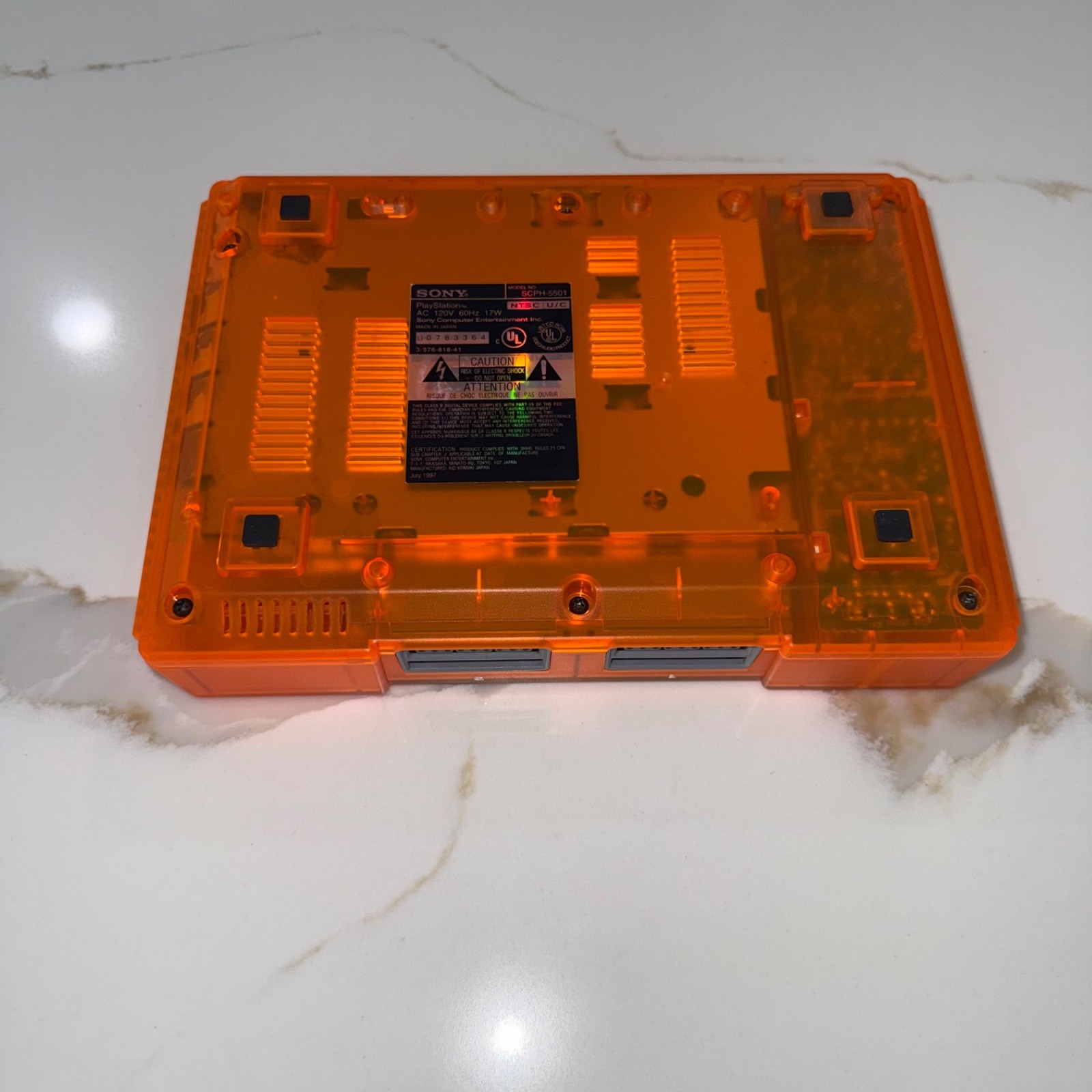 Sony PlayStation 1 Console (SCPH-5501) Bundle – Transparent Orange Clear Shell