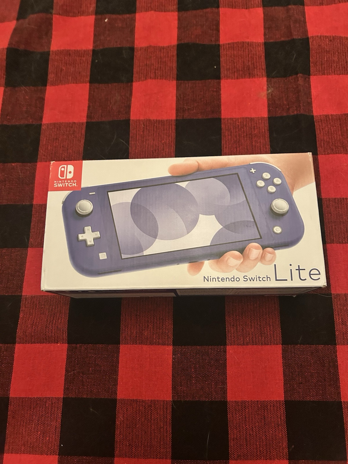 Brand New Nintendo Switch Lite Still In Box and never played on. 32GB-Blue