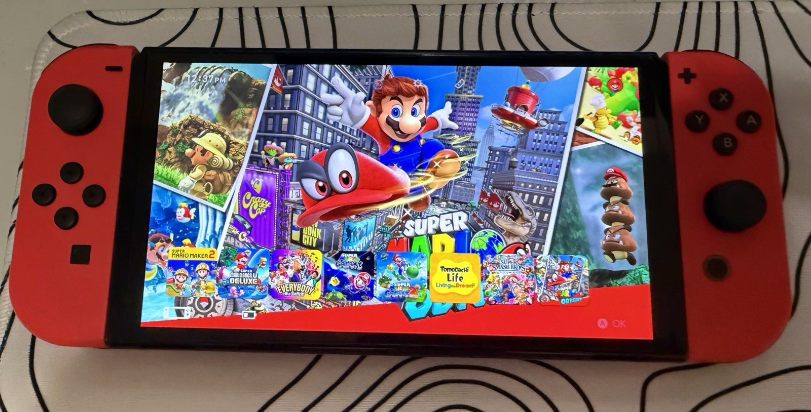 Nintendo Switch OLED Mario Odyssey Edition Bundle 64GB SD