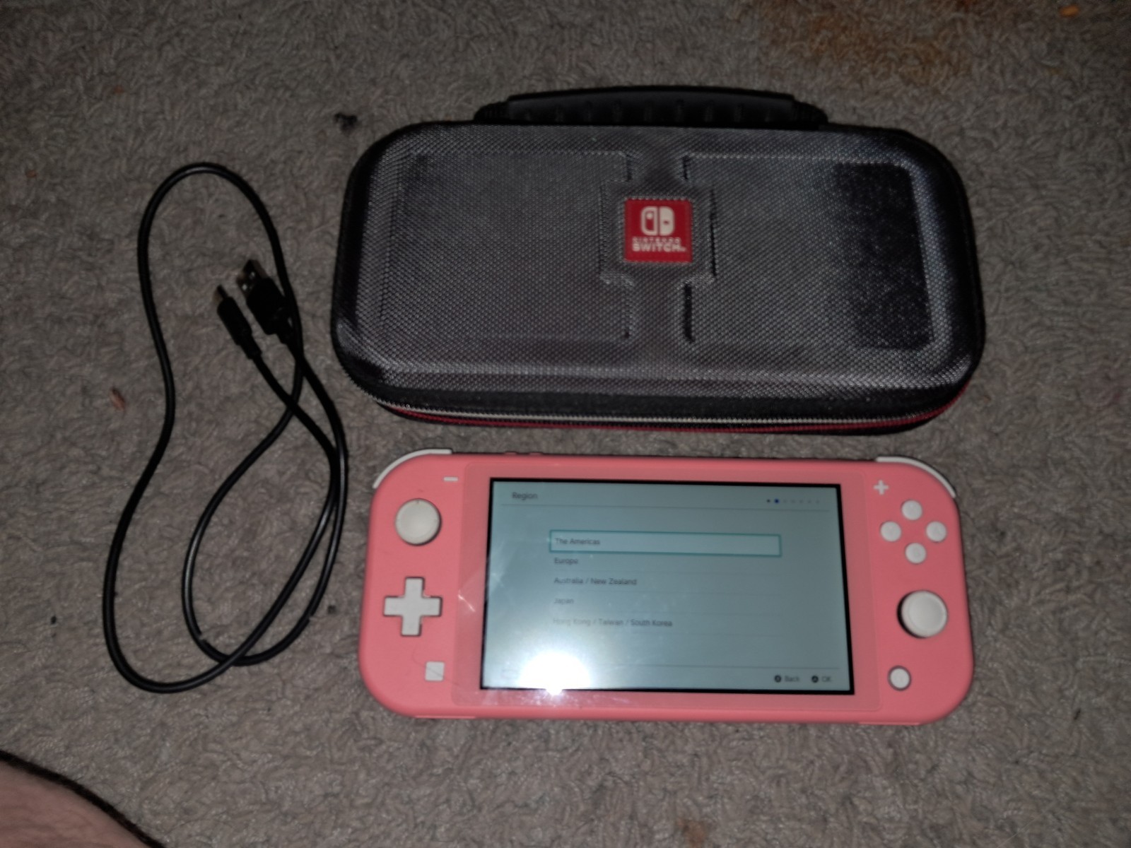 Nintendo Switch Lite Coral Used Excellent Working Condition comes with case