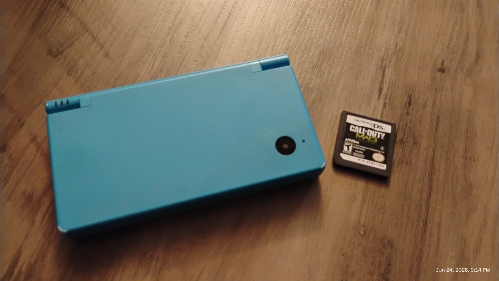 Nintendo DSi Blue Touchscreen Handheld System. w/ Call of Duty Modern Warfare 3