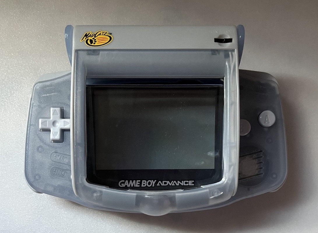 Nintendo Game Boy Advance Glacier Console AGB 001 Mad Cats Screen Mag Light
