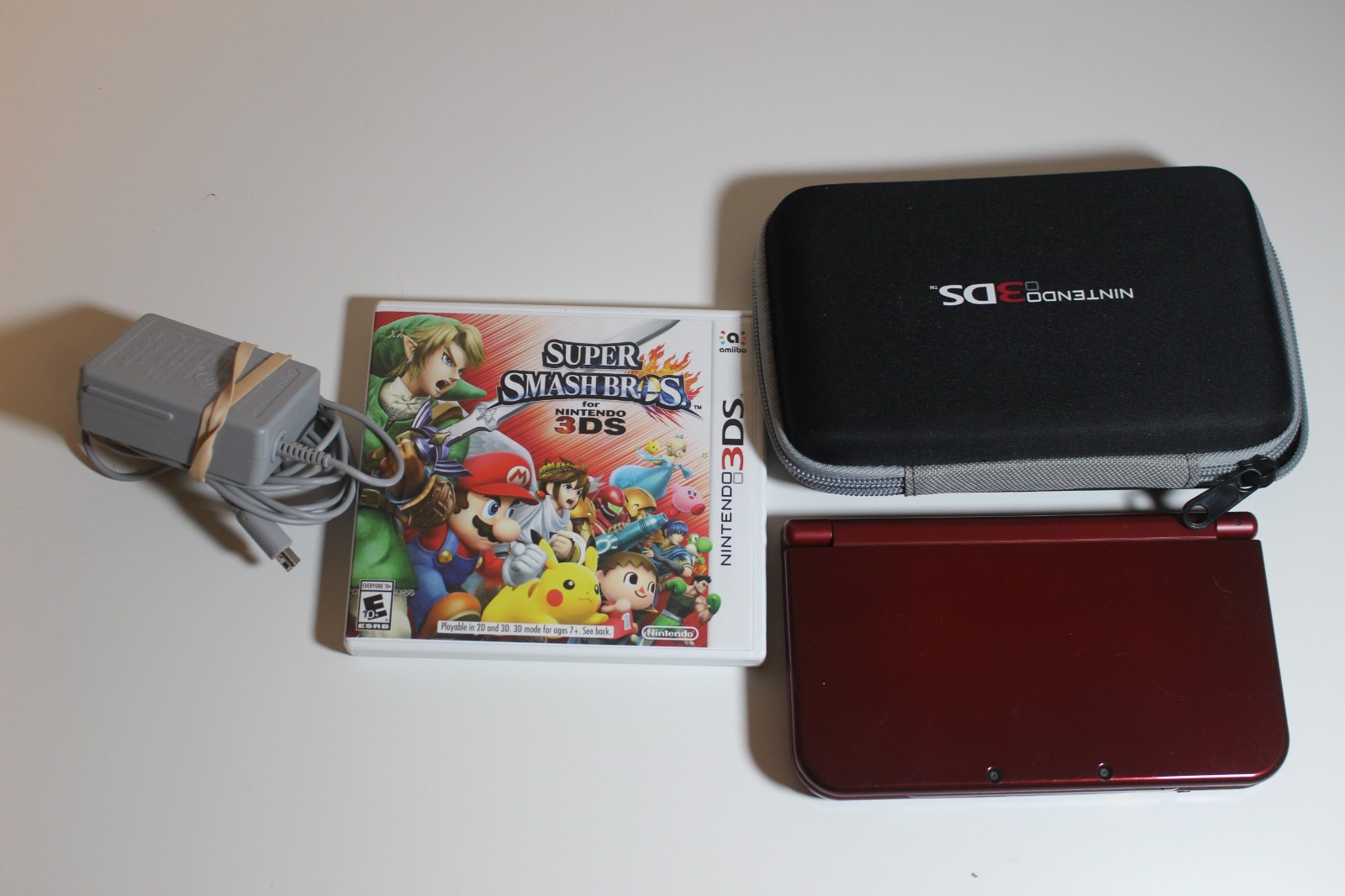 Nintendo New 3DS XL Console Handheld Bundle w Pokemon Y Moon Smash Brosh VGUC