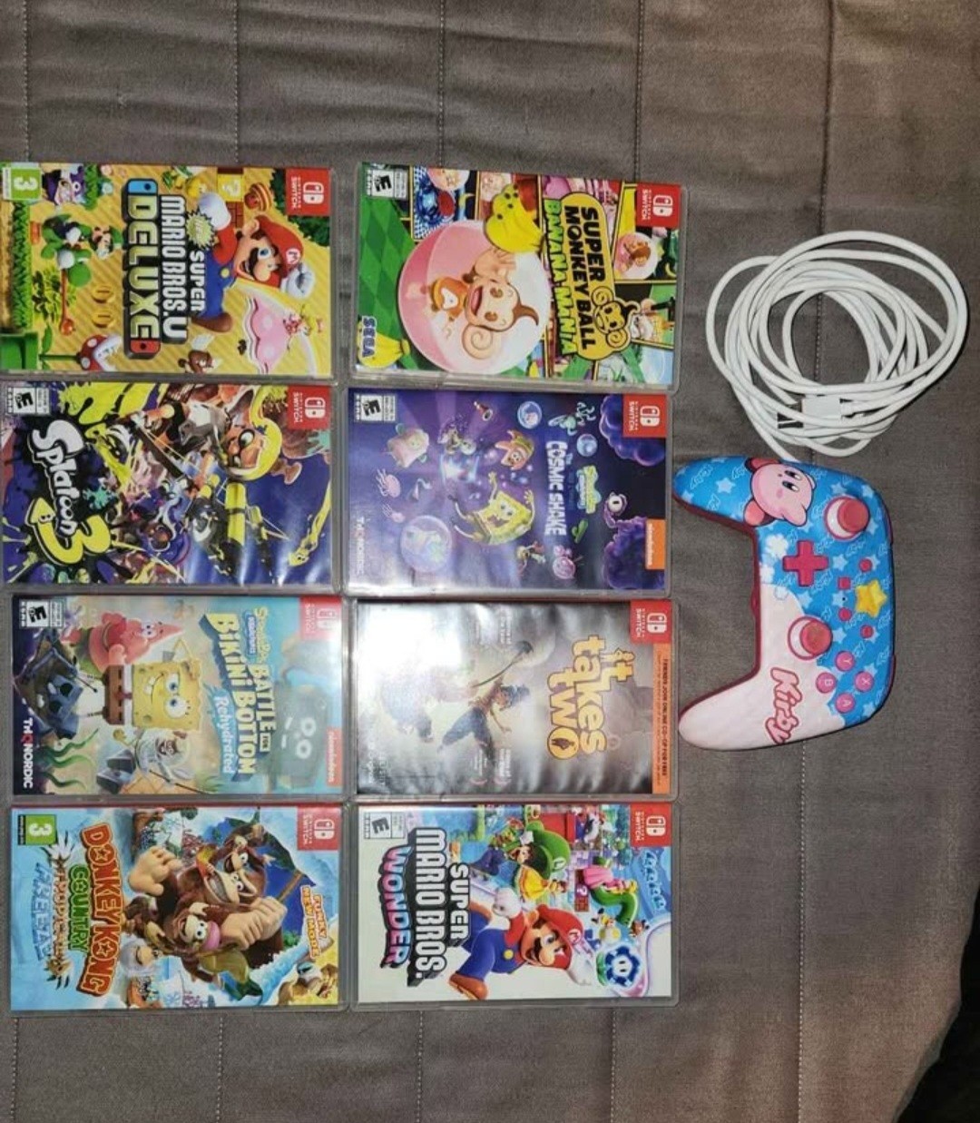 Nintendo Switch with Game Collection and Wired Controller