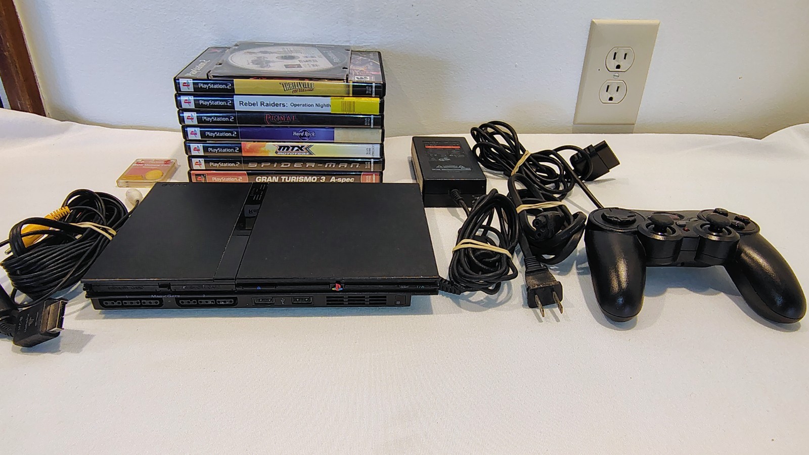 PS2 SLIM CONSOLE & ACCESSORIES W/MEMORY CARD/REMOTE & 6 GAMES – KINGDOM HEARTS +
