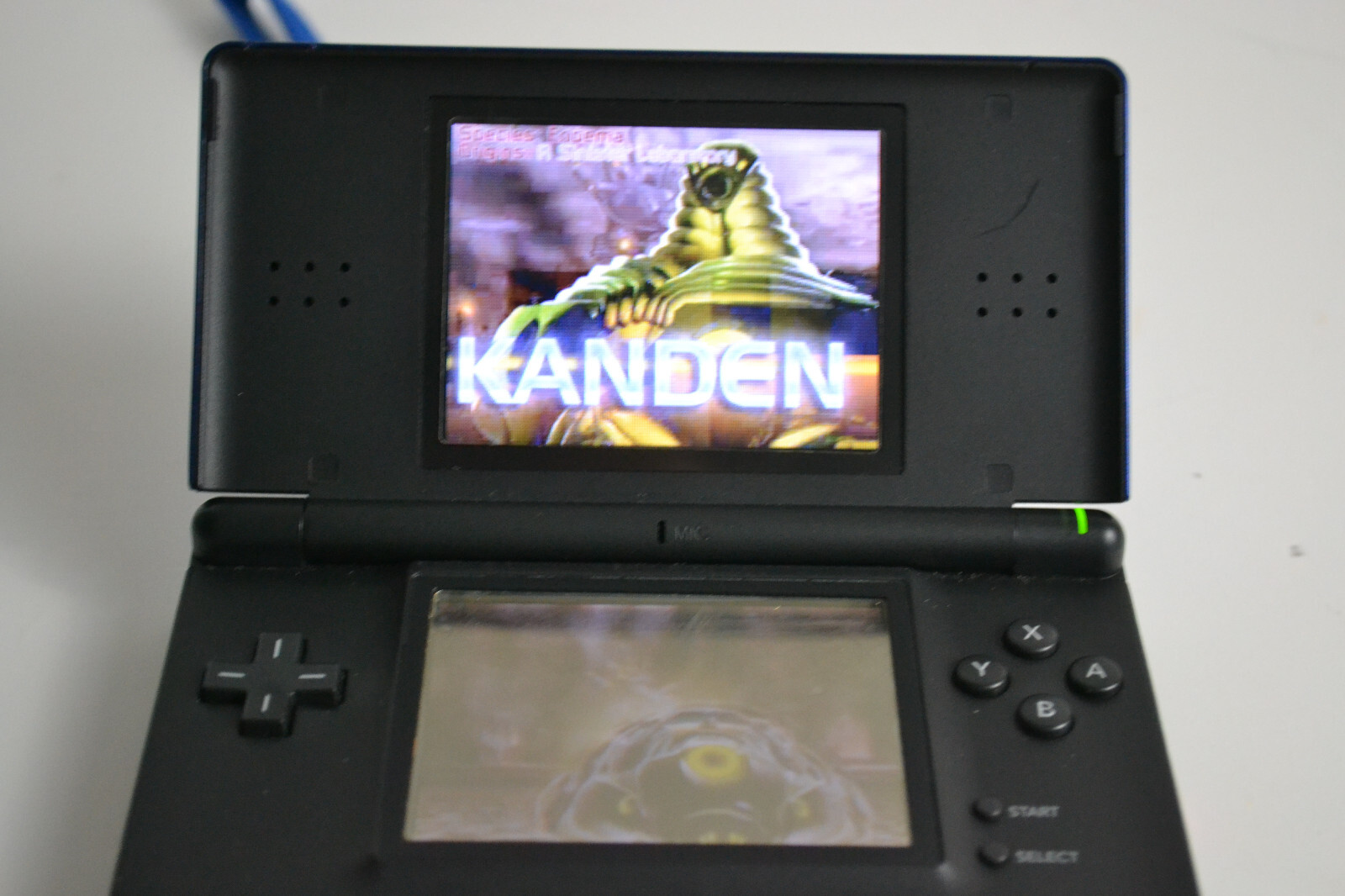 Nintendo DS Lite Handheld System – Cobalt/Black With Stylus 6 Games 2 Chargers