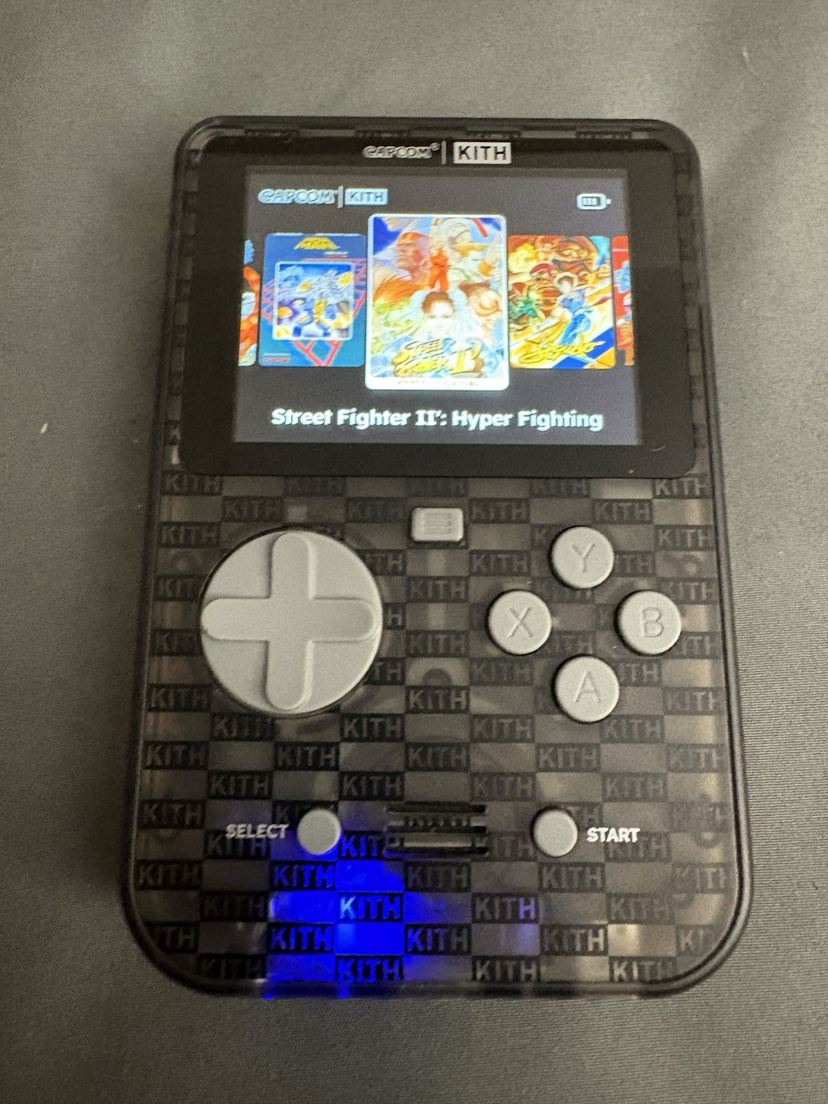 CAPCOM x KITH FOR HYPER MEGA TECH SUPER POCKET HANDHELD CLEAR CONSOLE