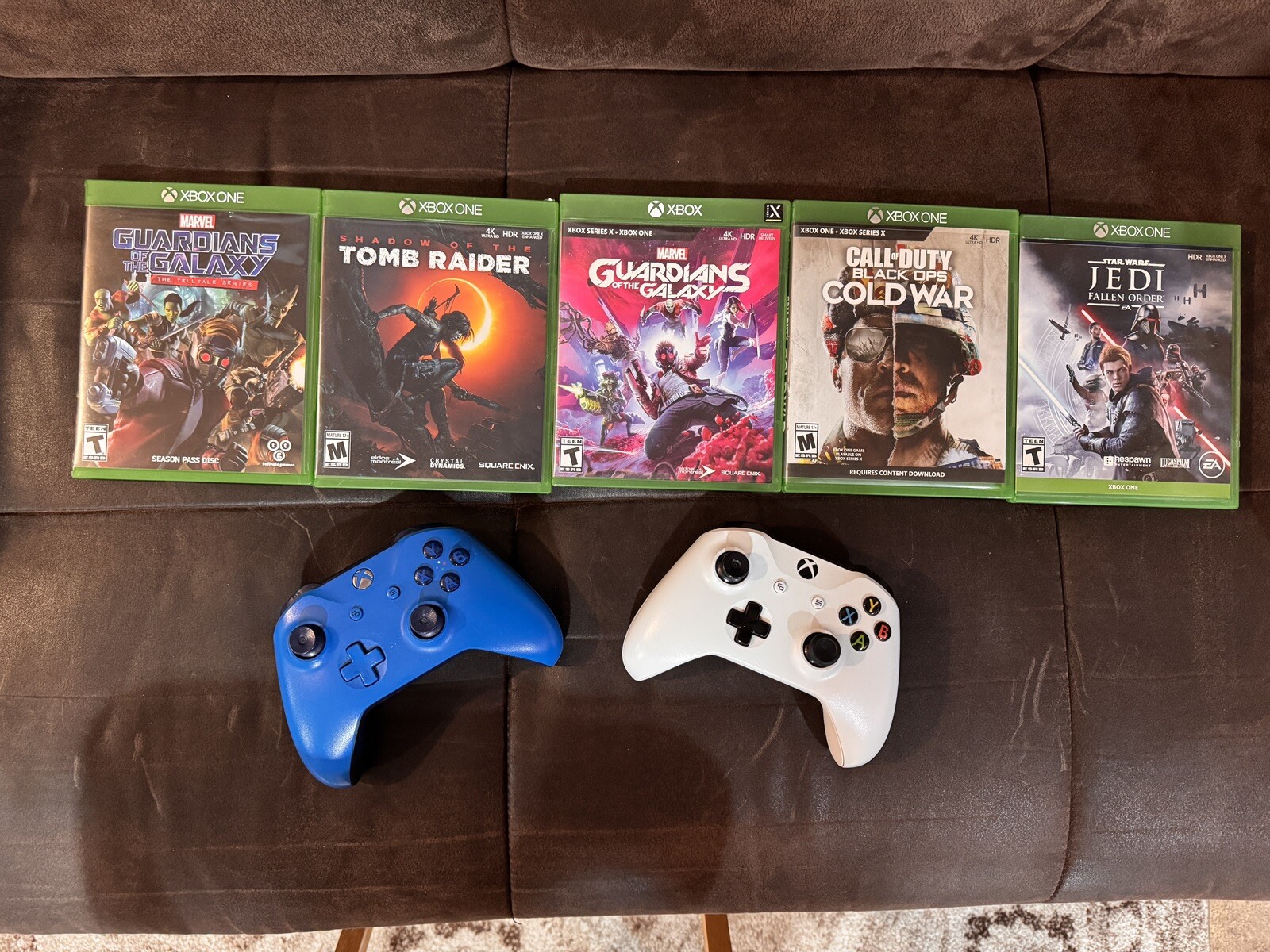 Xbox One S 1TB – White W/ 2 Controllers (1 White, 1 Blue) + 5 Games