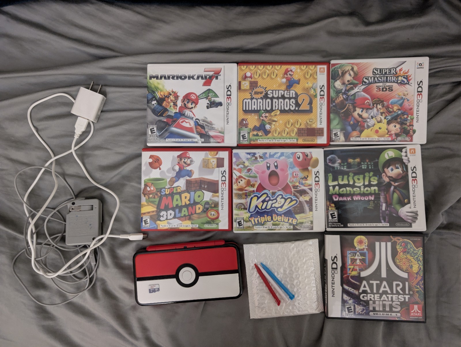 (Region Unlocked) Monster Ball New 2DS LL + 128GB MicroSD Card & 7 Games