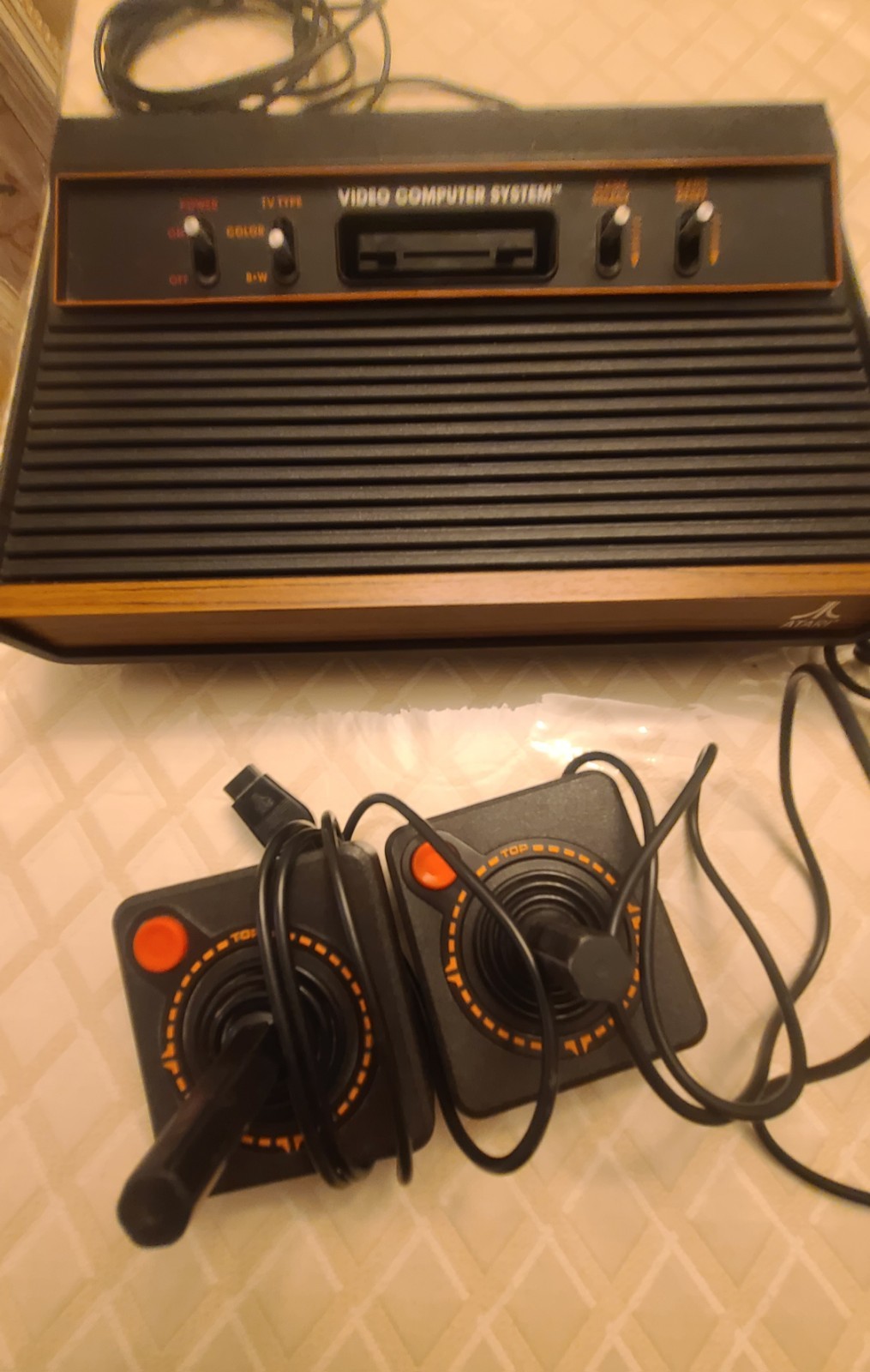 Atari-2600 Game Console, controllers 2 and 2 paddle game controllers. WORKS