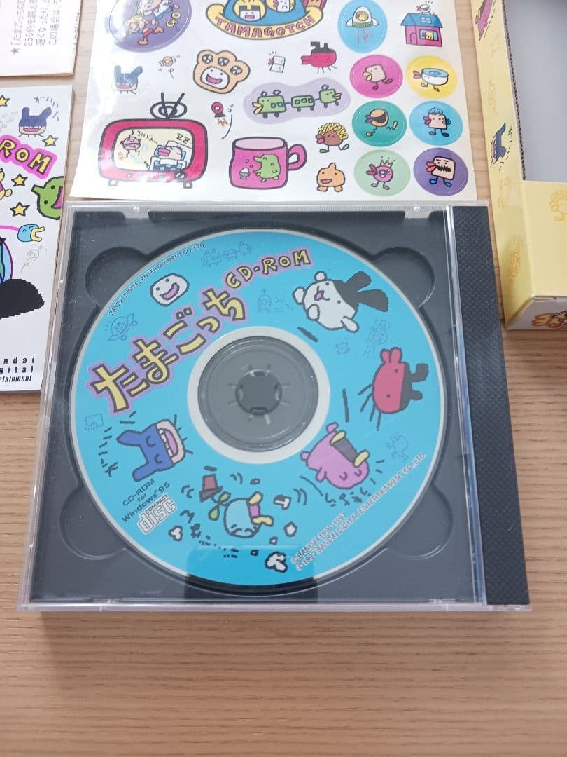 Retro Windows 95 Tamagotchi CD-ROM with Sticker – Rare PC Game