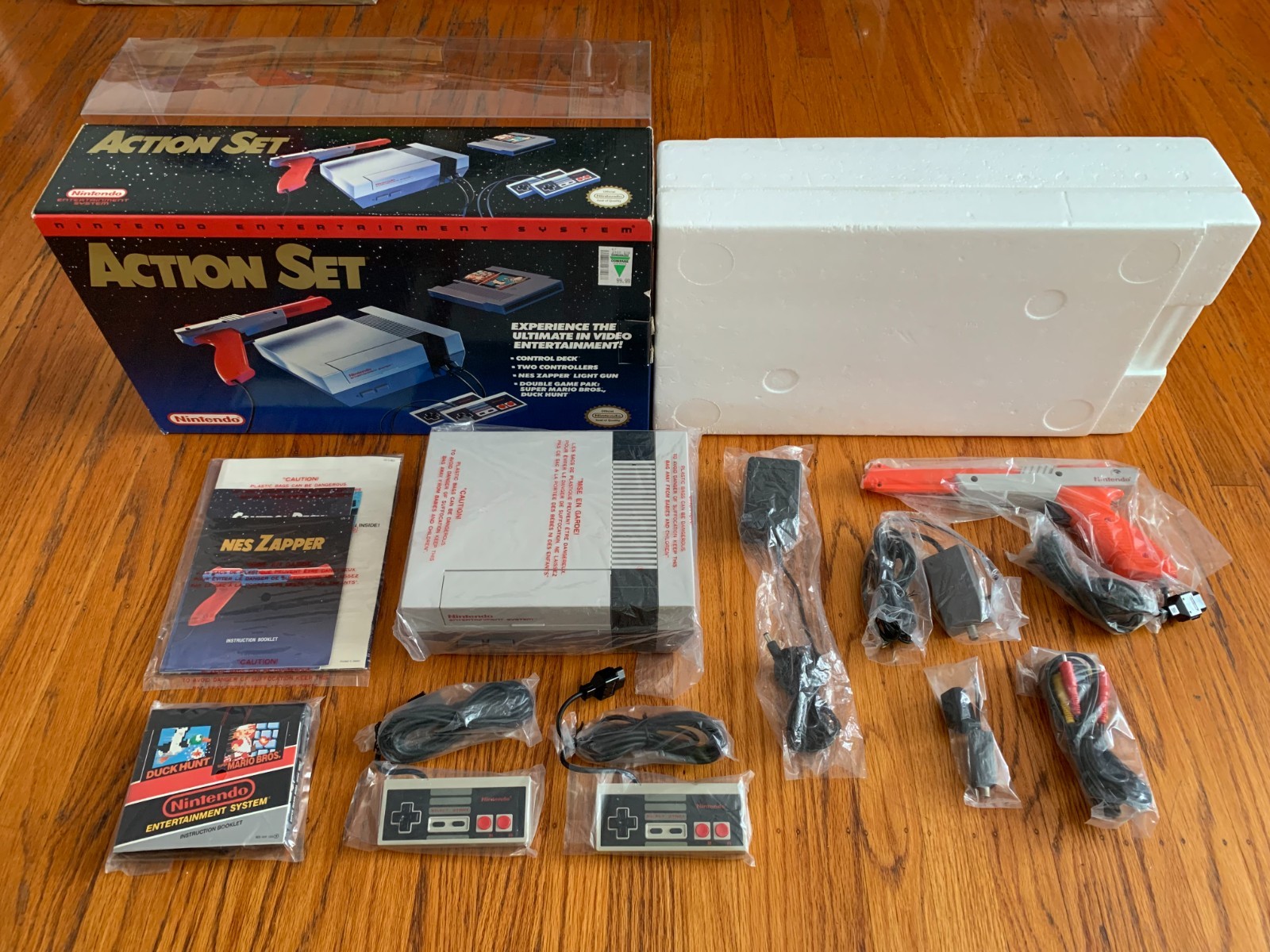 Nintendo NES Action Set console system 100% complete in box with protector