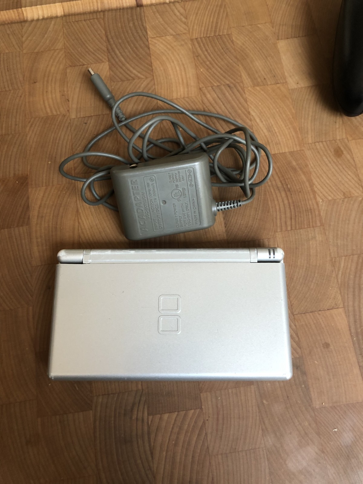 Nintendo DS Lite Launch Edition Silver Handheld System and charger