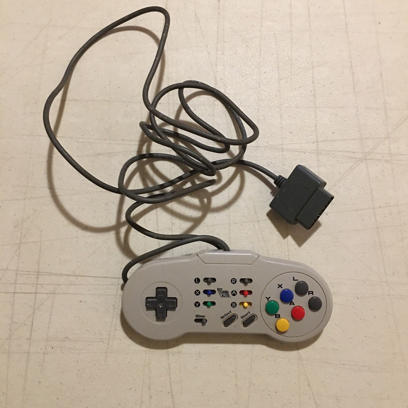 Vintage SNES Super Nintendo Blockbuster Video game console controller 1990s