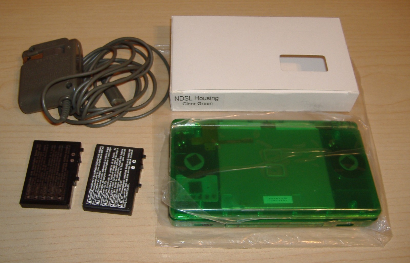 NINTENDO DS LITE TRANSPARENT GREEN NEW SHELL NEW DIGITIZER + USED OEM CHARGER