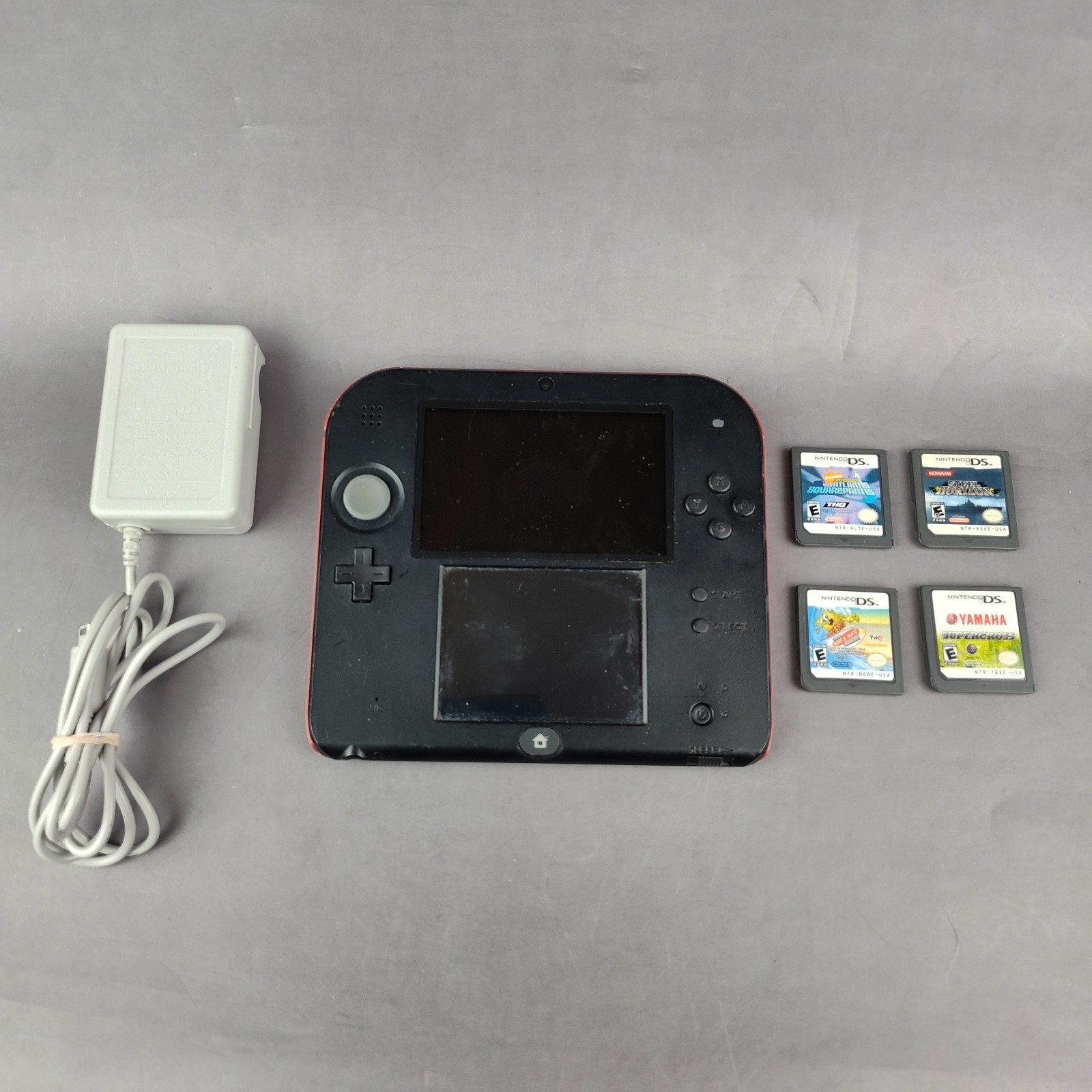 Nintendo 2DS Black/Red Handheld Console w/ Charger, Stylus, and 4 Games Tested