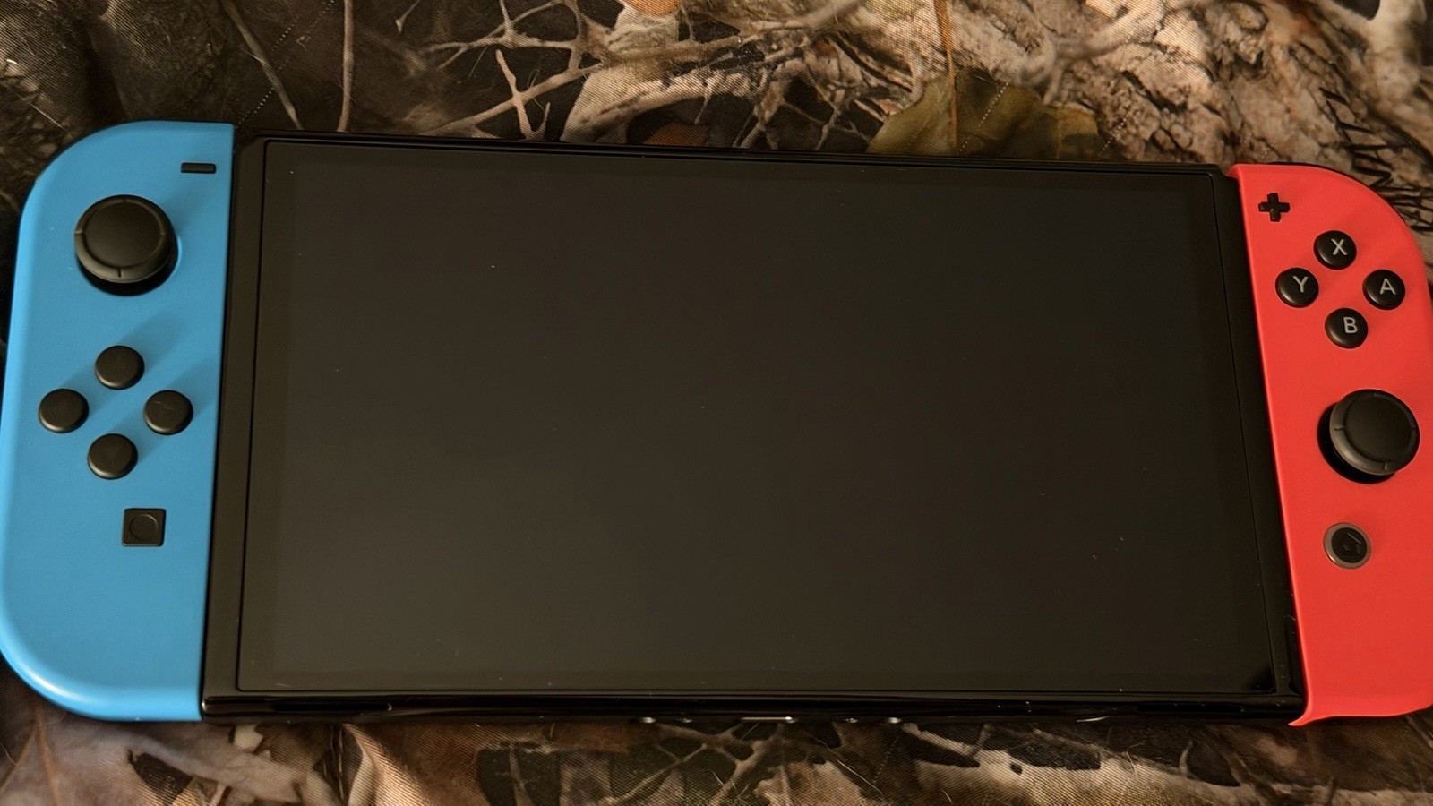 Nintendo Switch Oled, Wireless controller, Micro SD card, and Carrying case