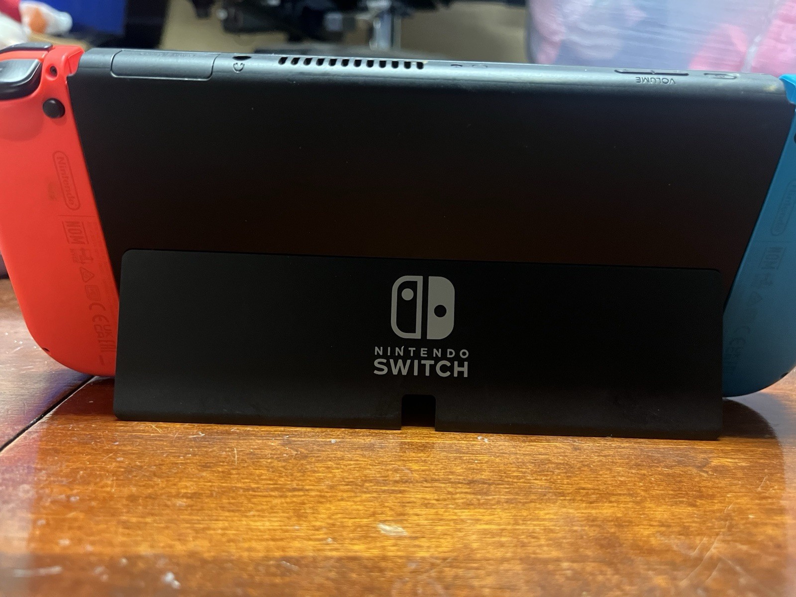 Nintendo Switch – OLED Model w/ Neon Red & Neon Blue Joy-Con