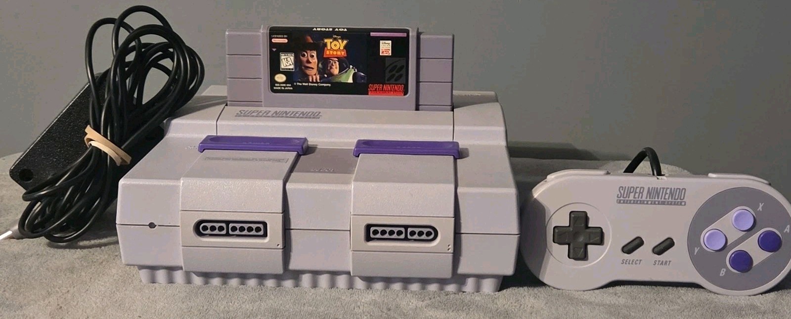 Nintendo SNES SNS-001 Console Bundle w/ Controller, Cables, Toy Story NTSC-U/C