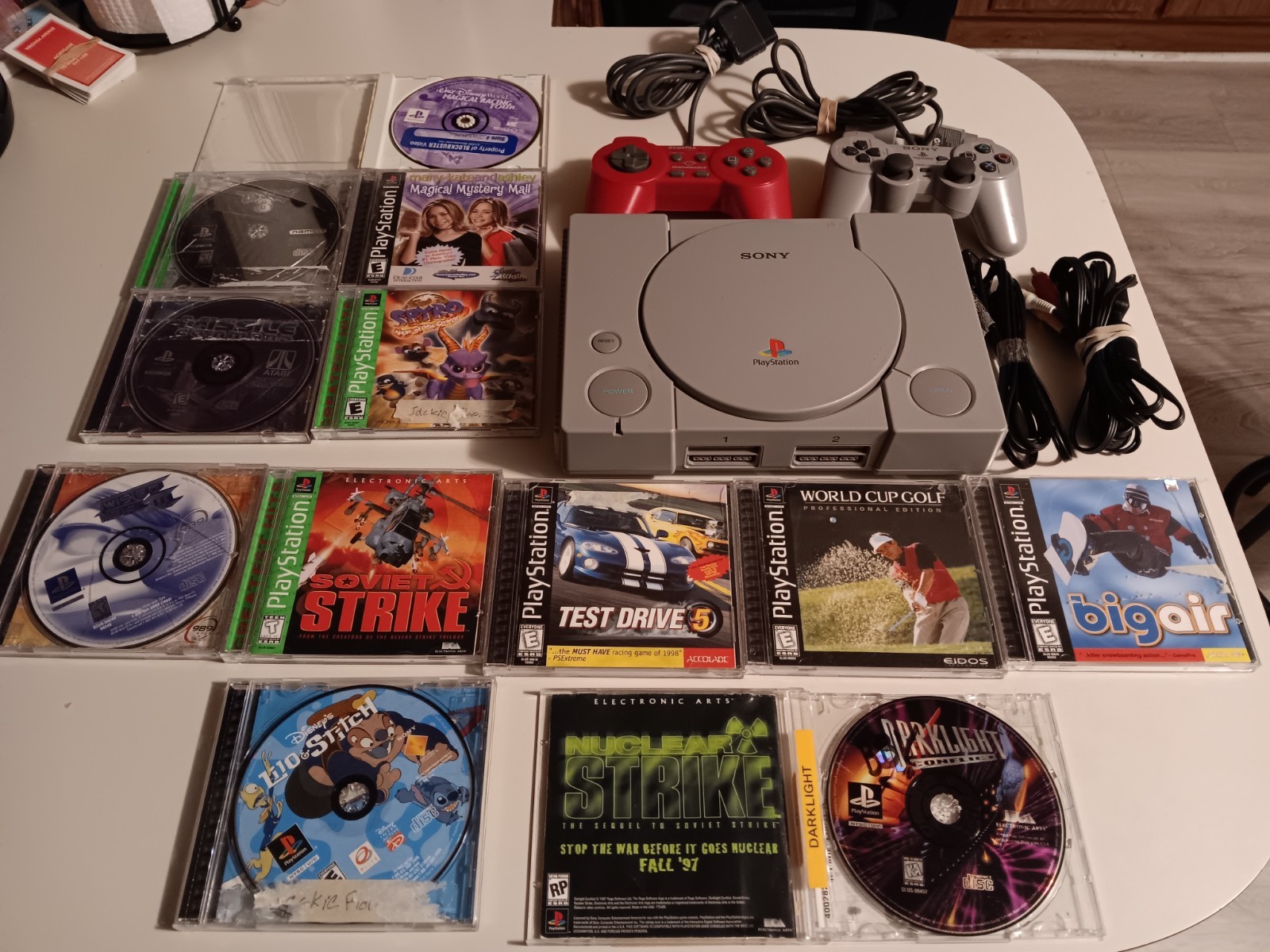 Vintage Sony Playstation 1 Console With Cords, 2 Controllers And 12 Games