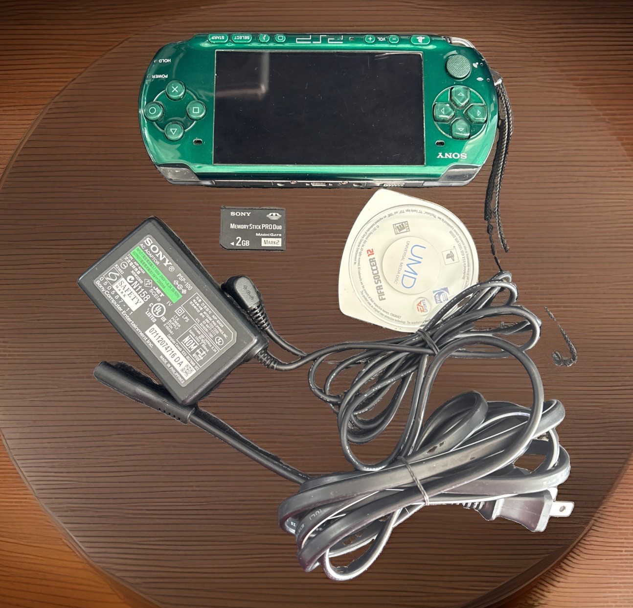 Sony PSP 3000 console OEM – Spirited Green + Official 2GB Card + Charger +fifa S