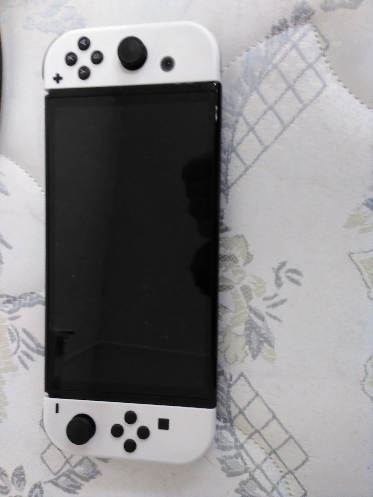 Nintendo Switch OLED Model – 64GB/White bundle, with a zelda case and 9 games