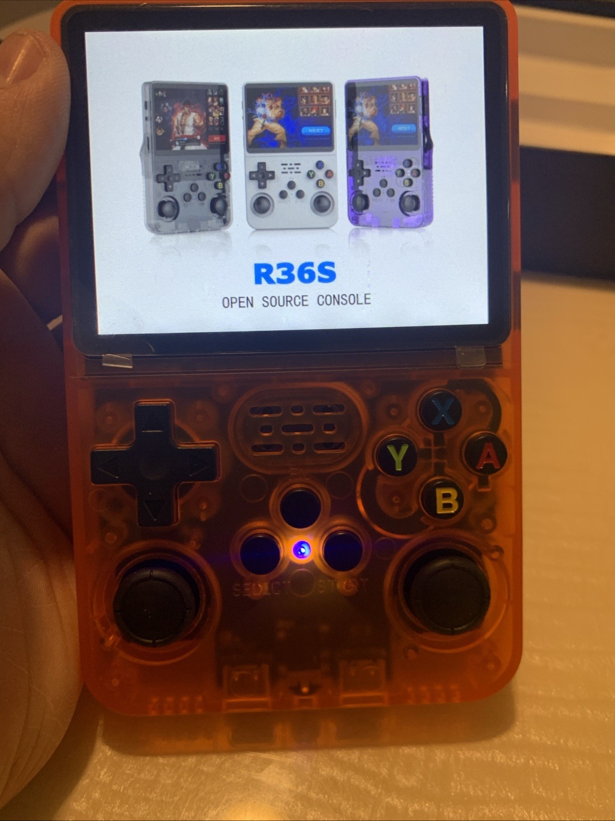 R36S Handheld Game Console 640×480 Quad-Core ARM 1GB RAM Purple 64 Gb TF Card