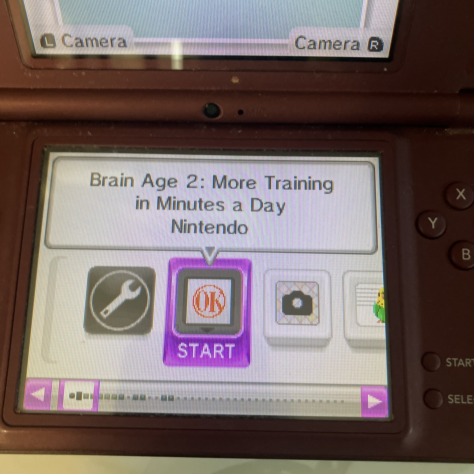 Nintendo DSI XL Handheld console+ Video game brain age 2 + charger red color