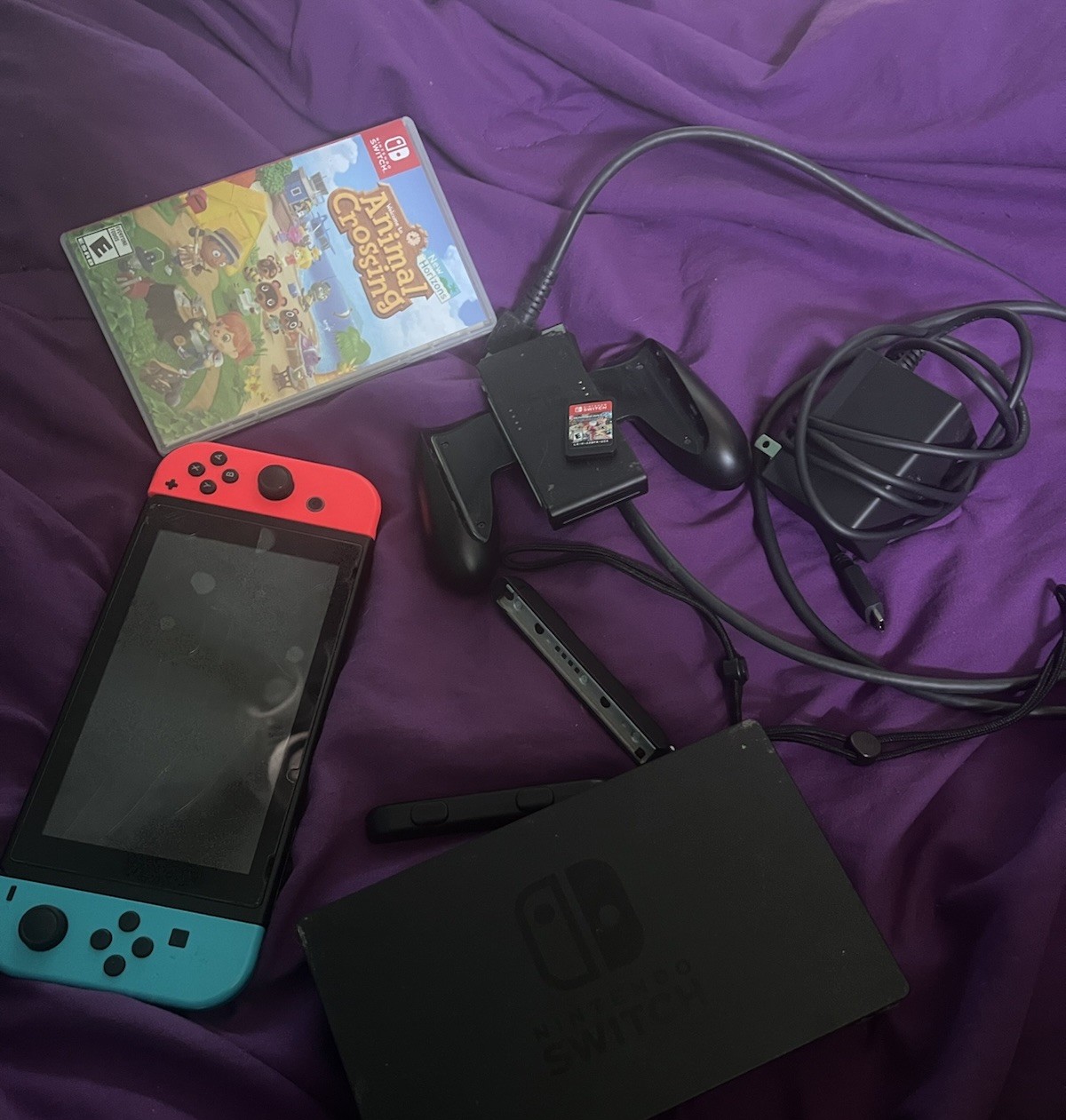 (PLUS 2 GAMES) Nintendo Switch 32GB Neon Red/Blue Joy-Cons Dock Charger Grip