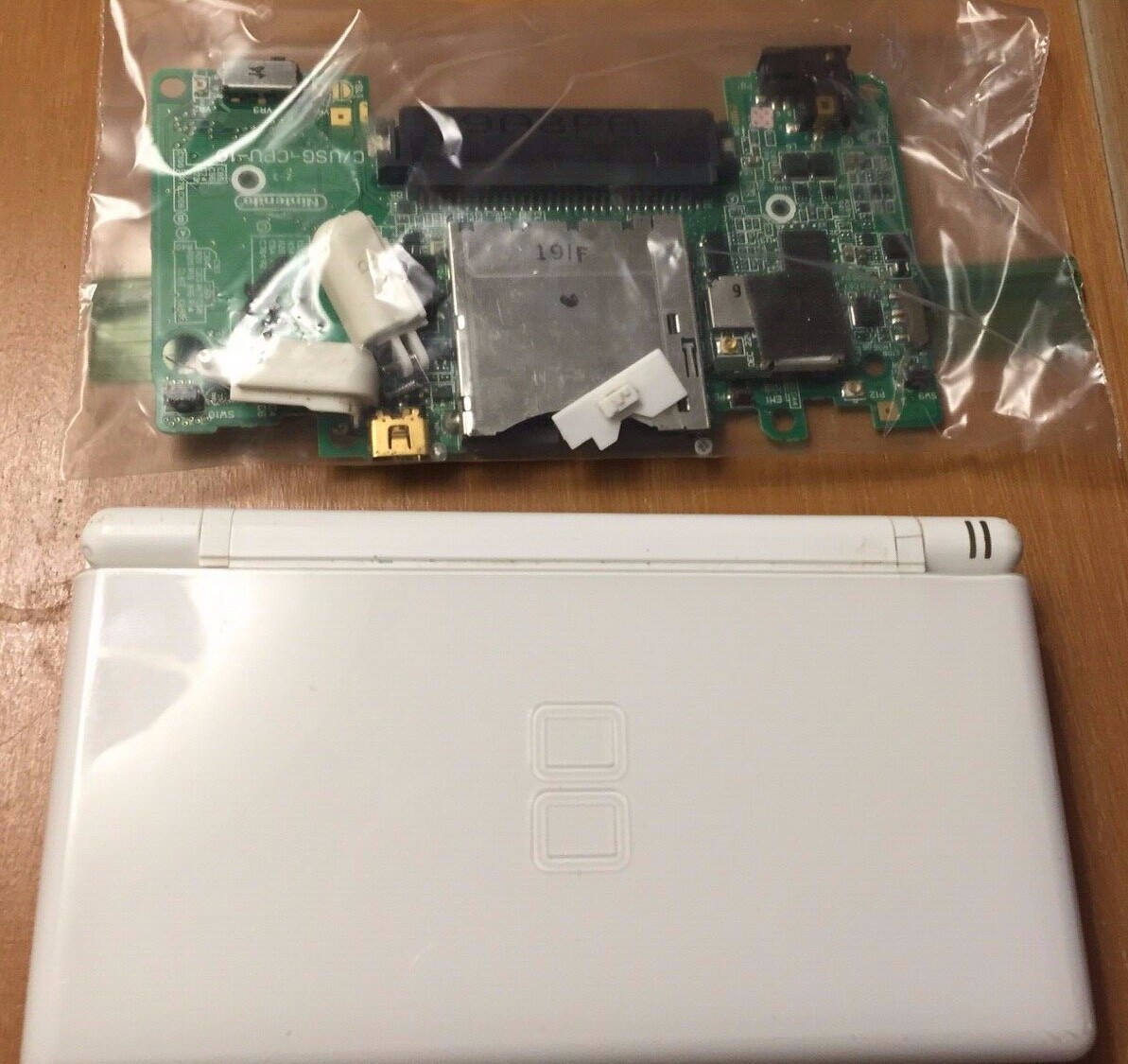 Nintendo DS Lite Handheld White (2 boards for parts)