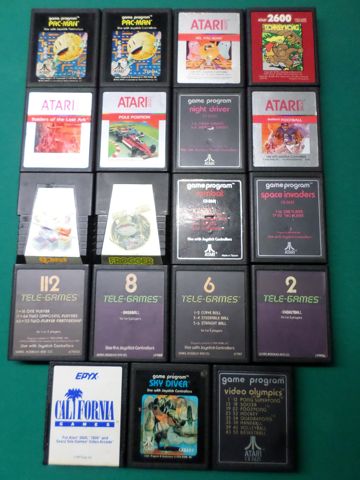 ATARI JR 2600, 19 CASSETTES WITH 2OO GAME VARIATIONS , READ