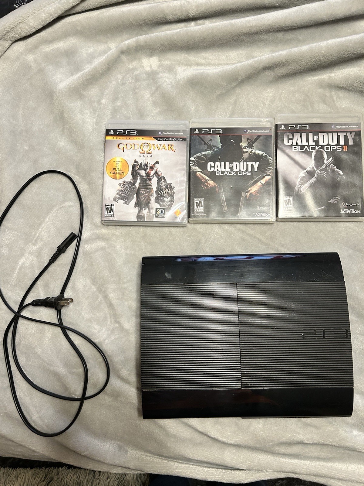 Sony PlayStation 3 Super Slim Cech 4201A 12GB Console With Power Cord And Games