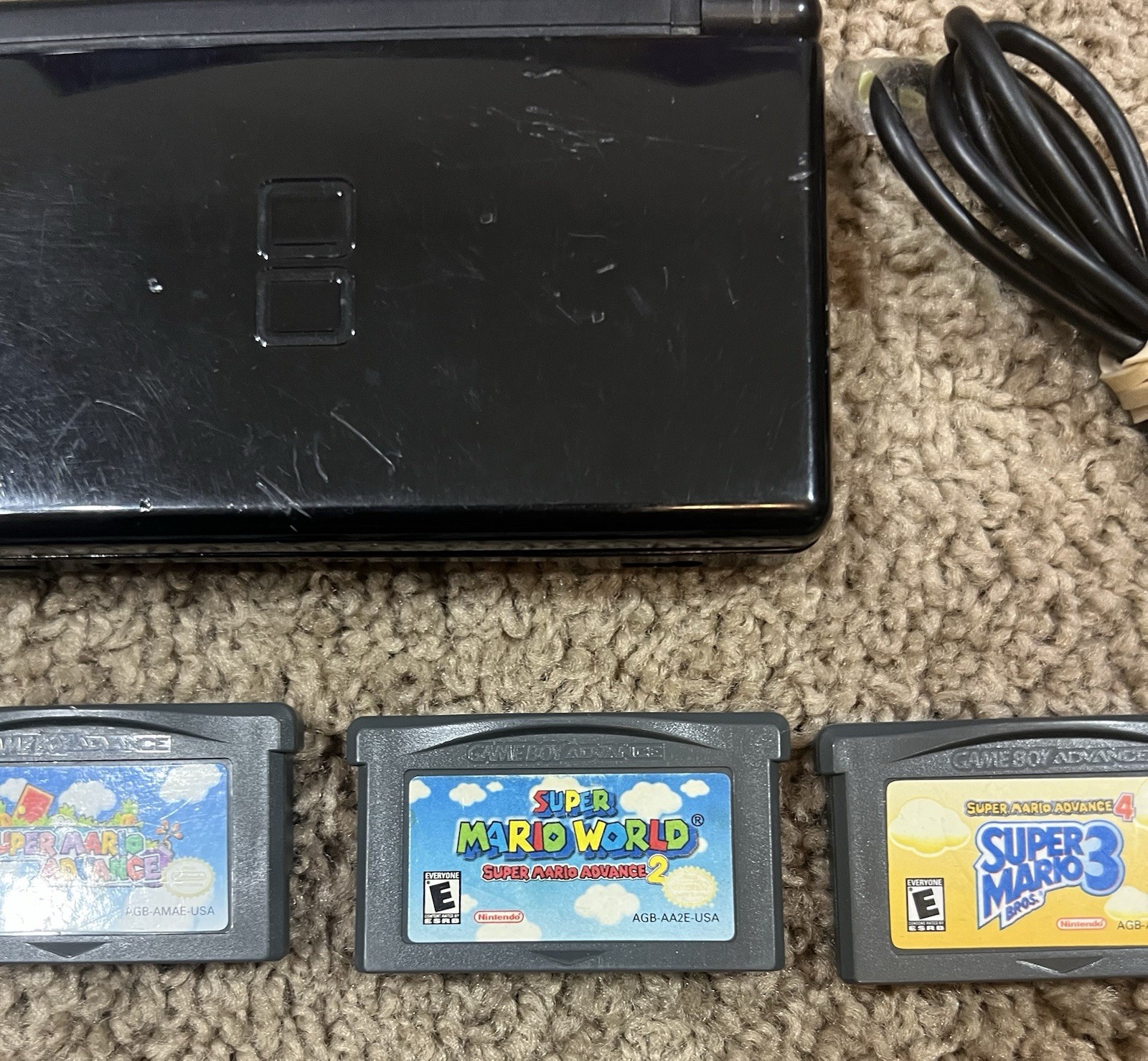 Nintendo DS Lite Bundle With 3 Games Super Mario Advance 1, 2, & 3