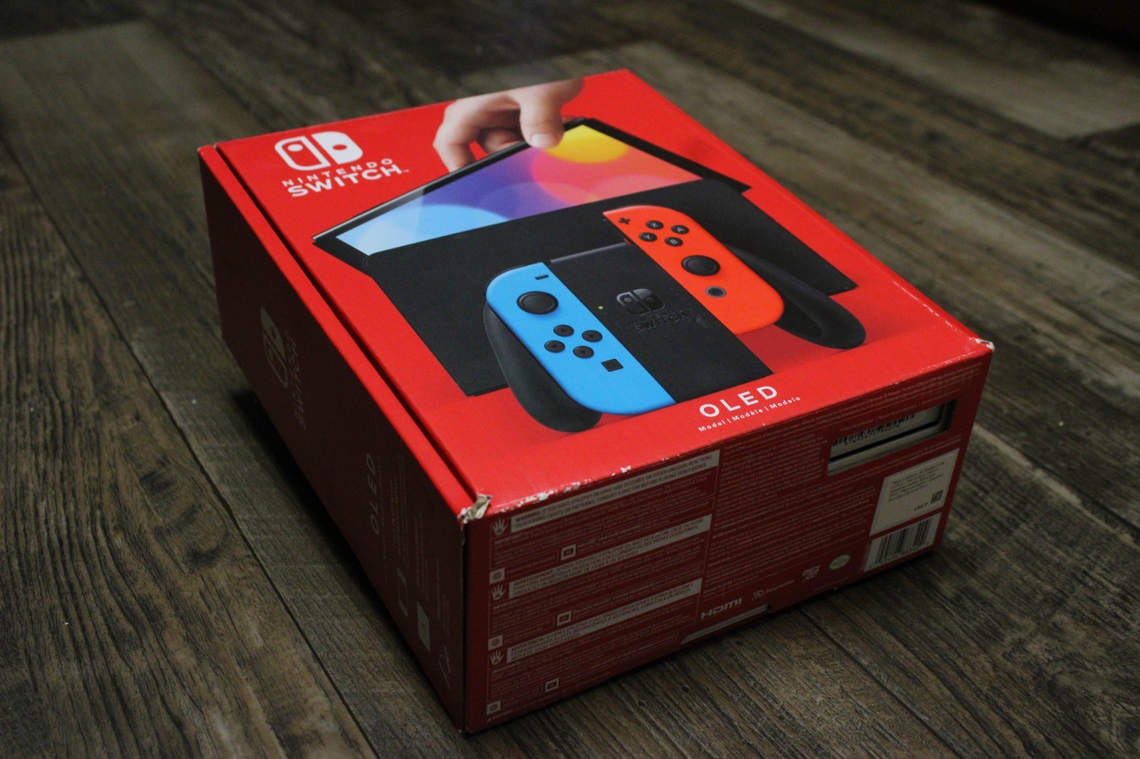 Nintendo Switch – OLED Model w/ Neon Red & Neon Blue Joy-Con