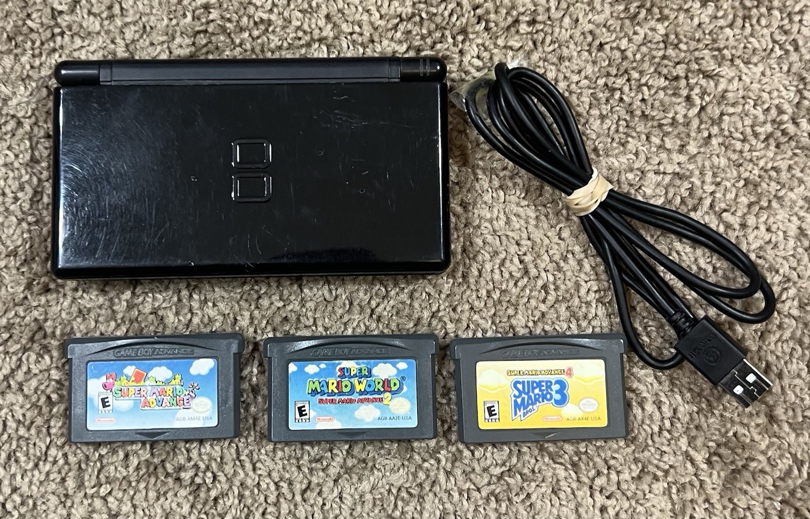 Nintendo DS Lite Bundle With 3 Games Super Mario Advance 1, 2, & 3