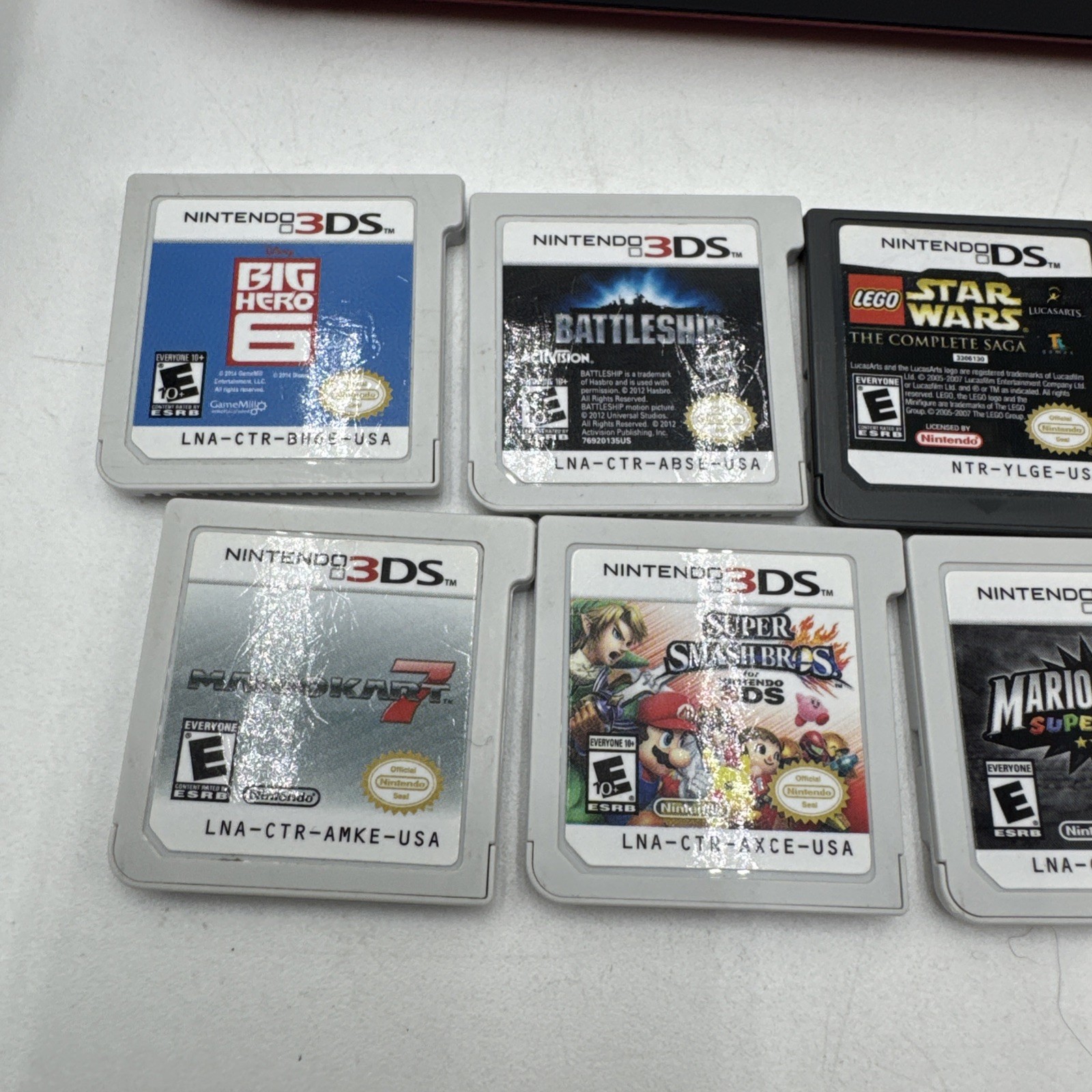 Nintendo 3DS XL Red Handheld Console w/ 7 Games Mario Tested Read