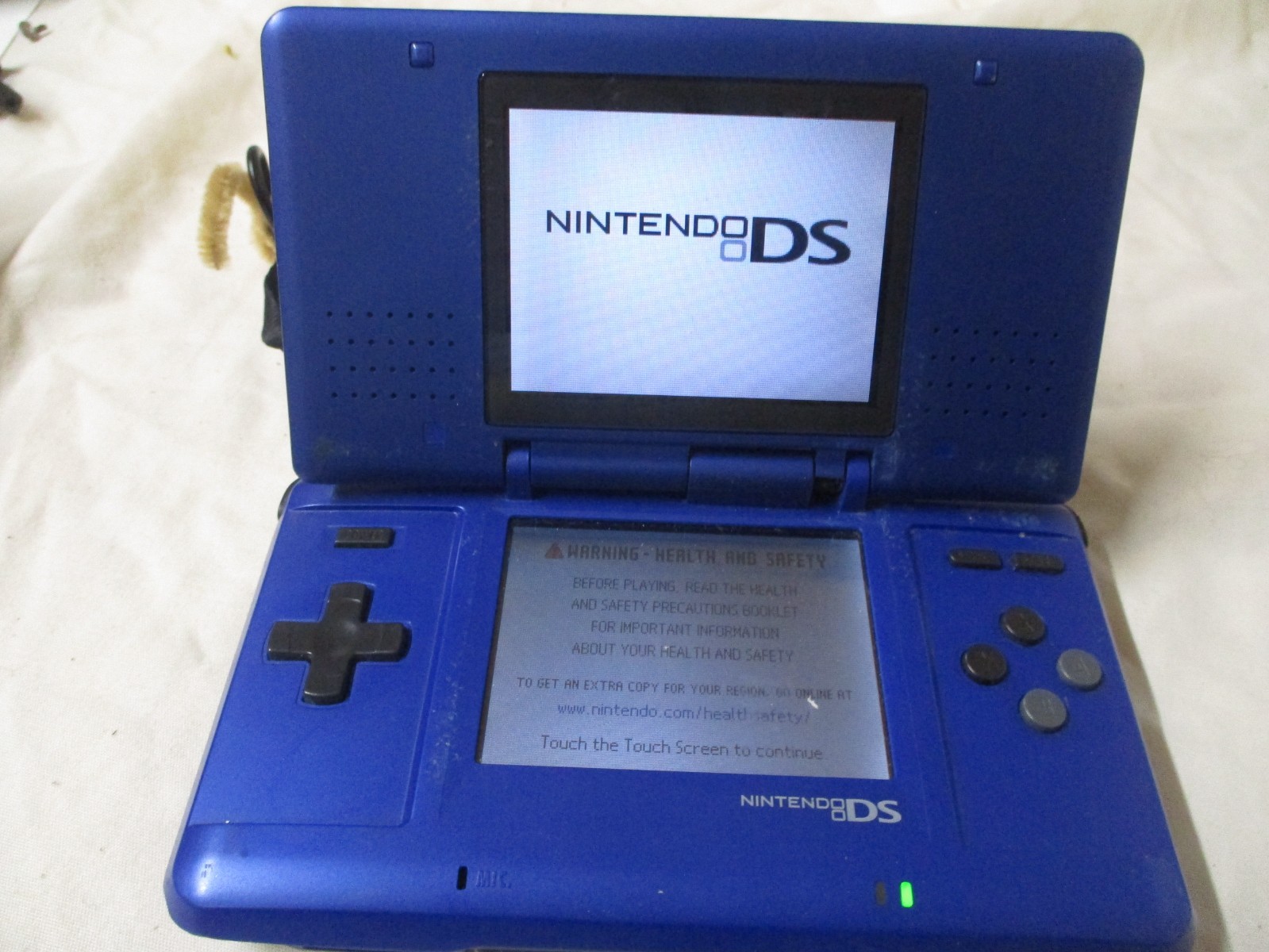 NINTENDO DS BLUE WITH GAMEBOY ADVANCE AND DS ABILITY 1 ARM BROKE