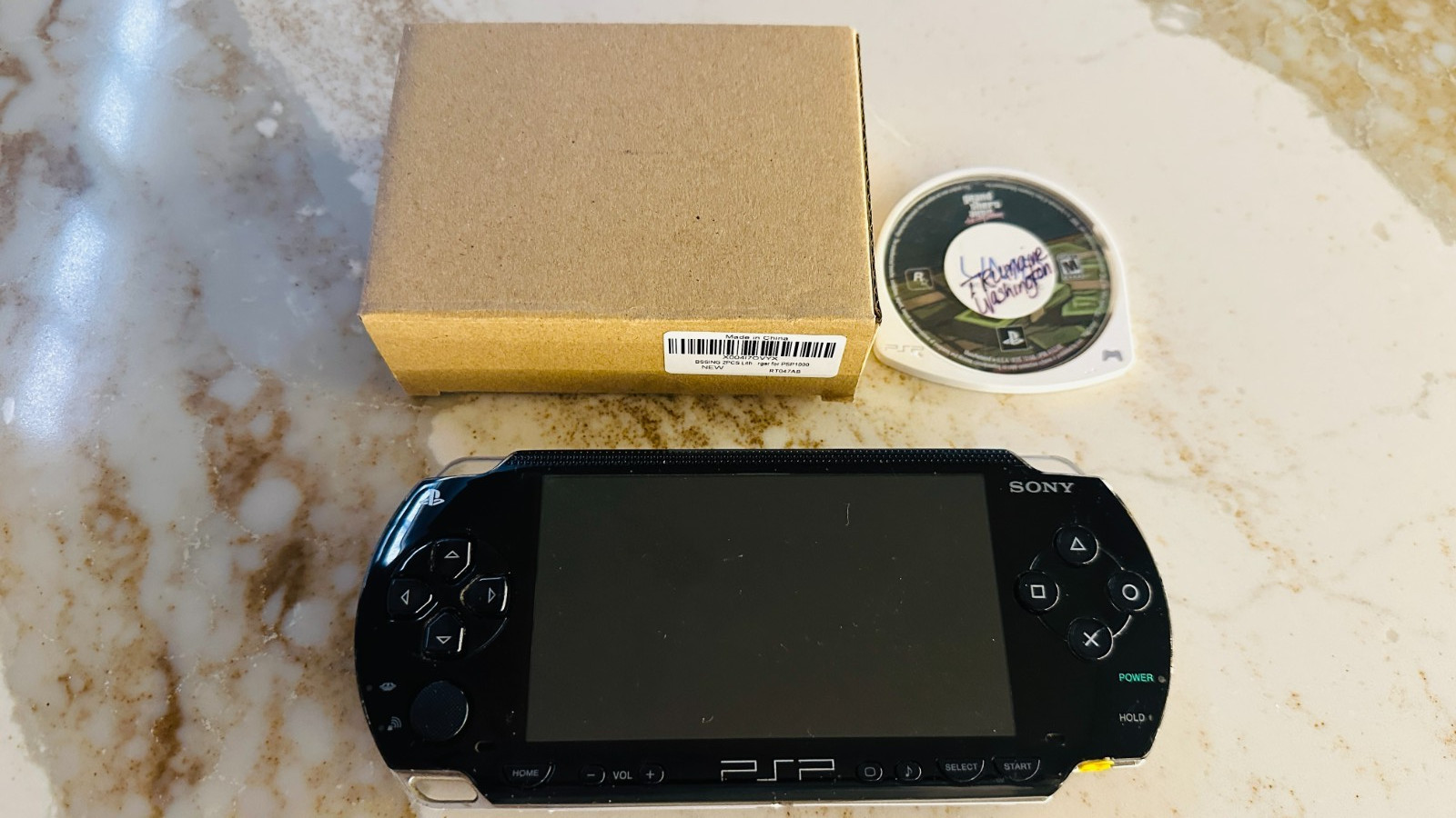 Sony PSP-1001 PlayStationPortable Handheld Black Console w/GTA Game Cartridge