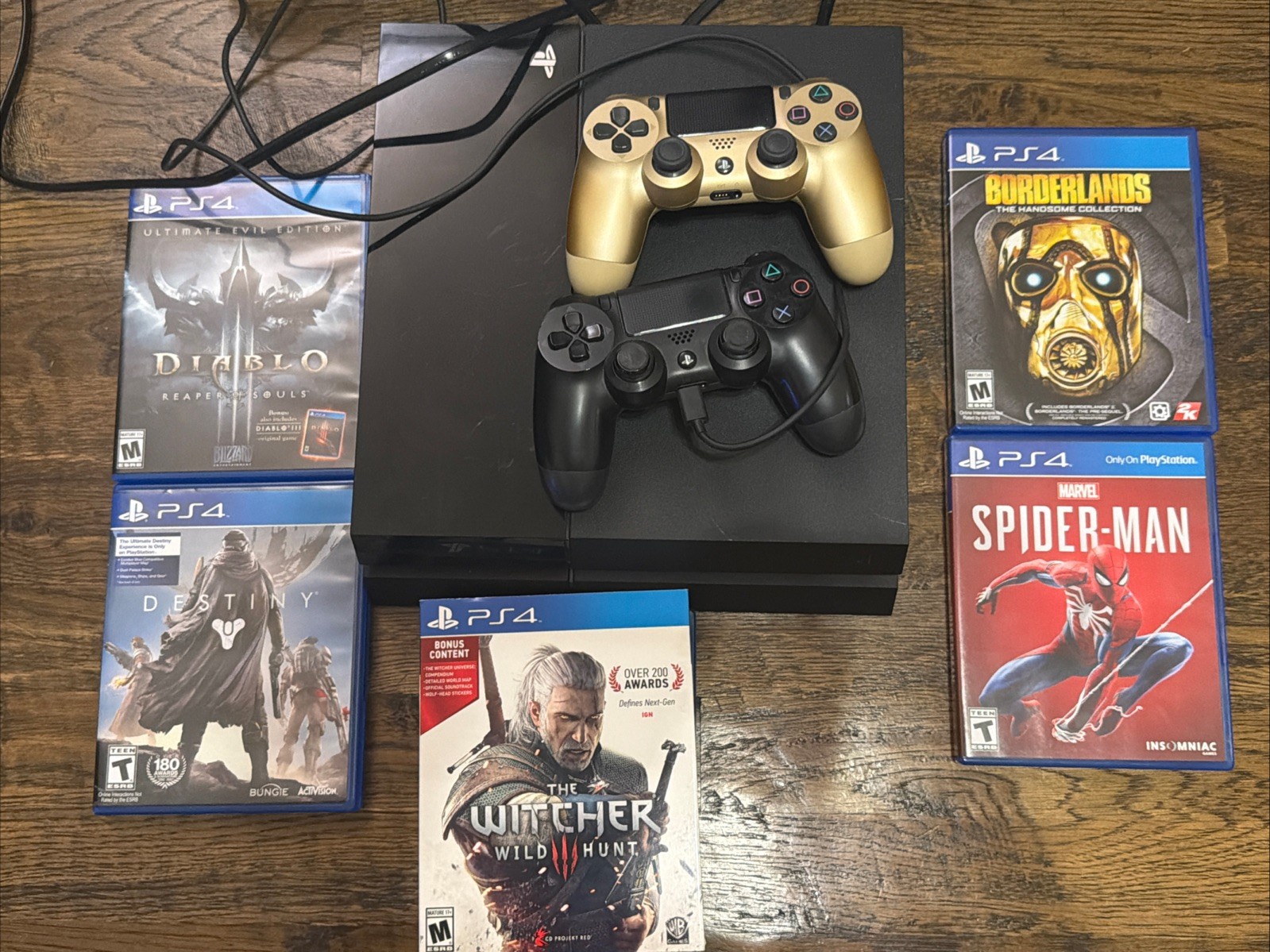 Sony PlayStation 4 Slim 500GB Black Console with 2 Controllers and 5 Games