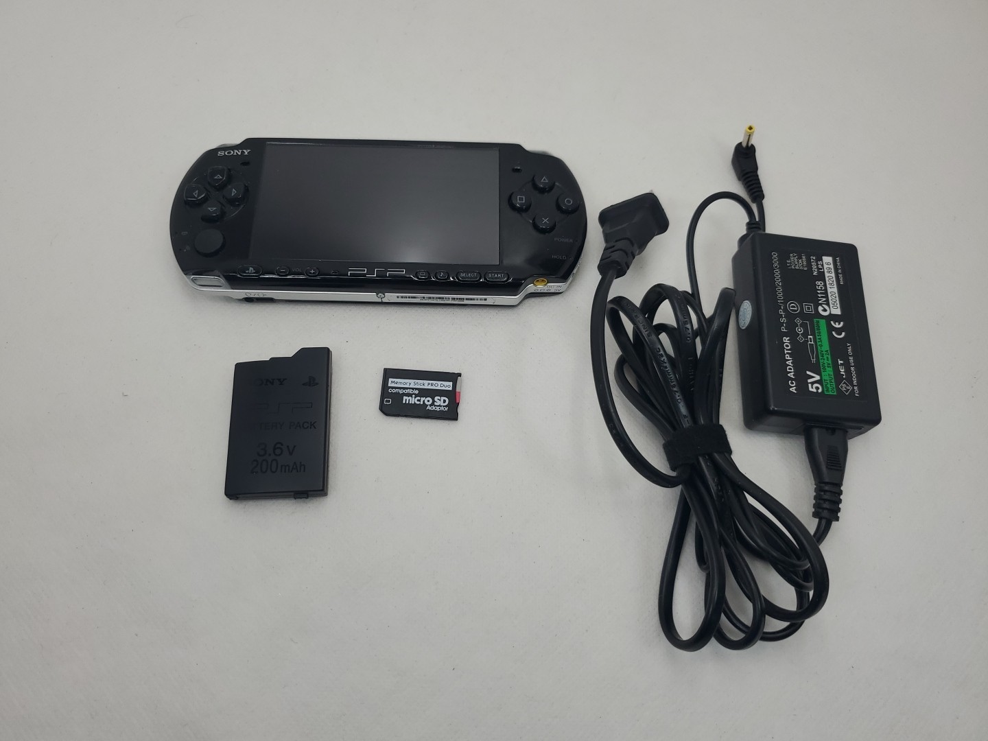 Sony PSP 3006 Asia Ver. Console W/ Charger, Memory Card & 100+ Games See Descrip