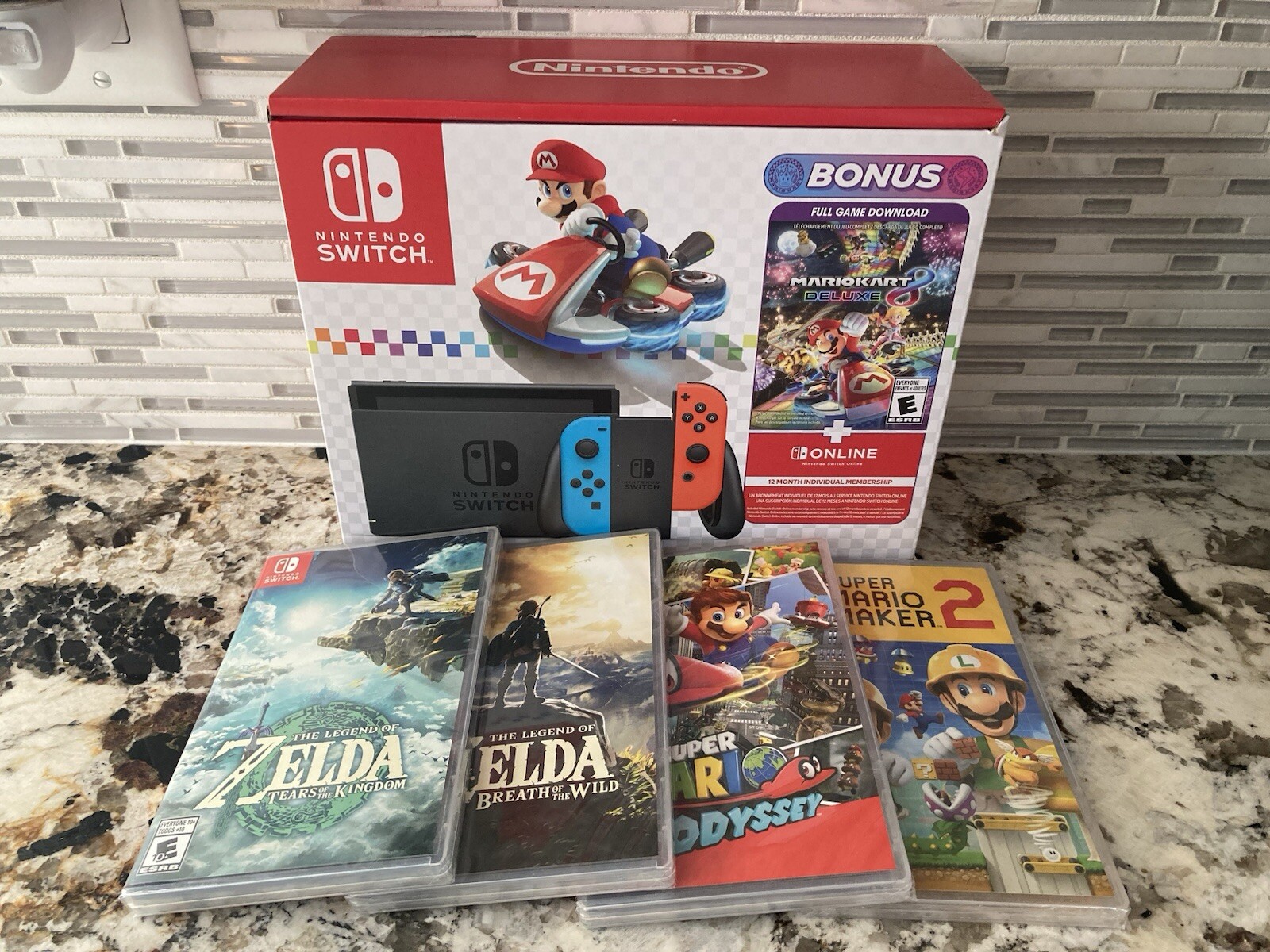Nintendo Switch Mario Kart 8 Bundle + 4 Games of Choice Zelda Odyssey Maker NEW