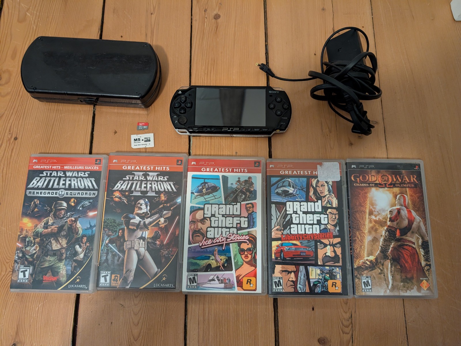 Sony PSP 2001 (modified) + 32GB SD + 5 Games + Hard Case – Tested & Working
