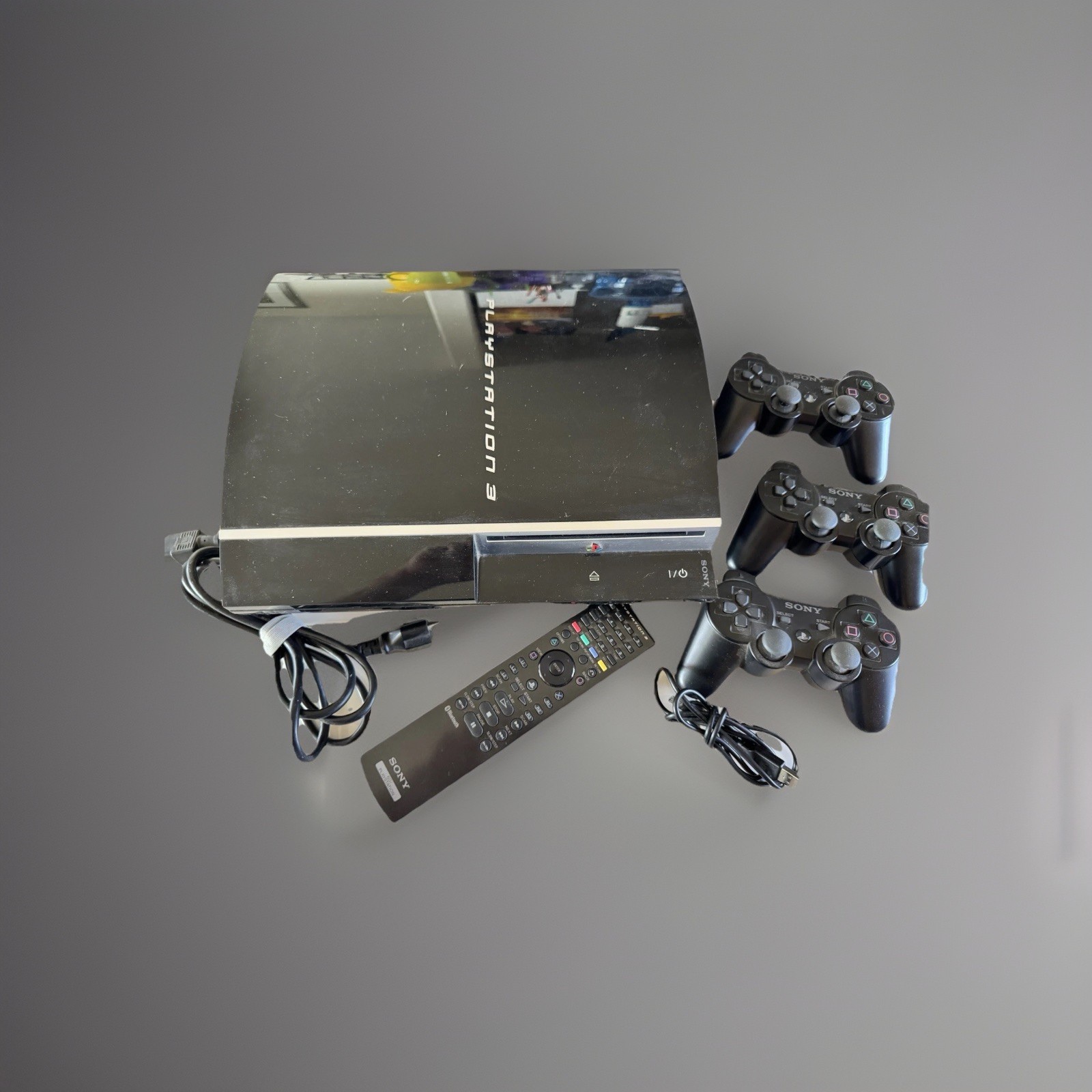 PS3 Bundle (3 Controllers and Remote) + Buzz Game Set
