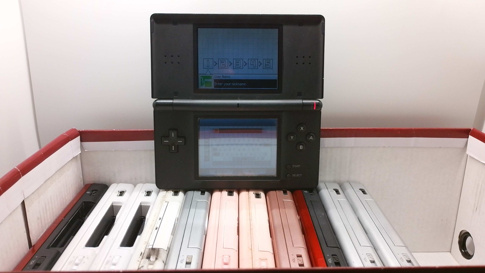 Lot of 12 DS Lites (USG-001) in Mostly Working Condition: USED [Free Shipping]