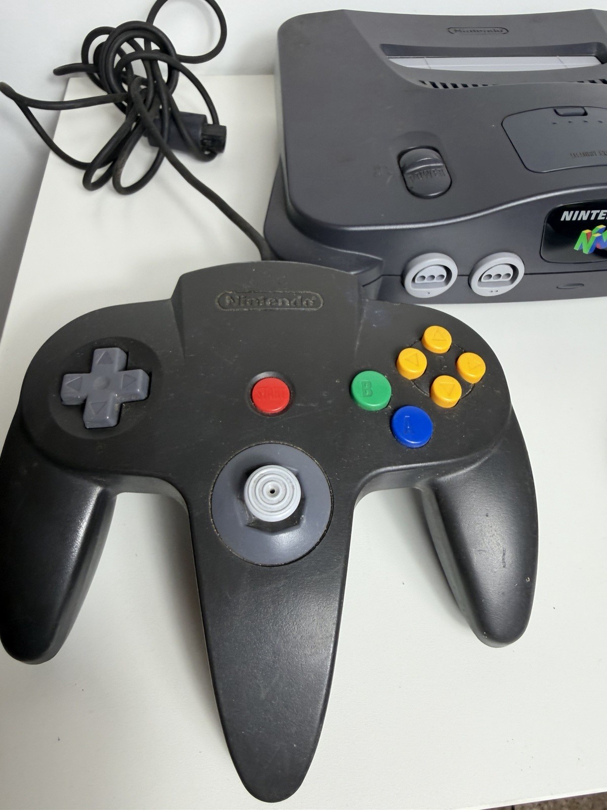 Nintendo 64- Black Working Great. Comes With Cables And 1 OEM Controller