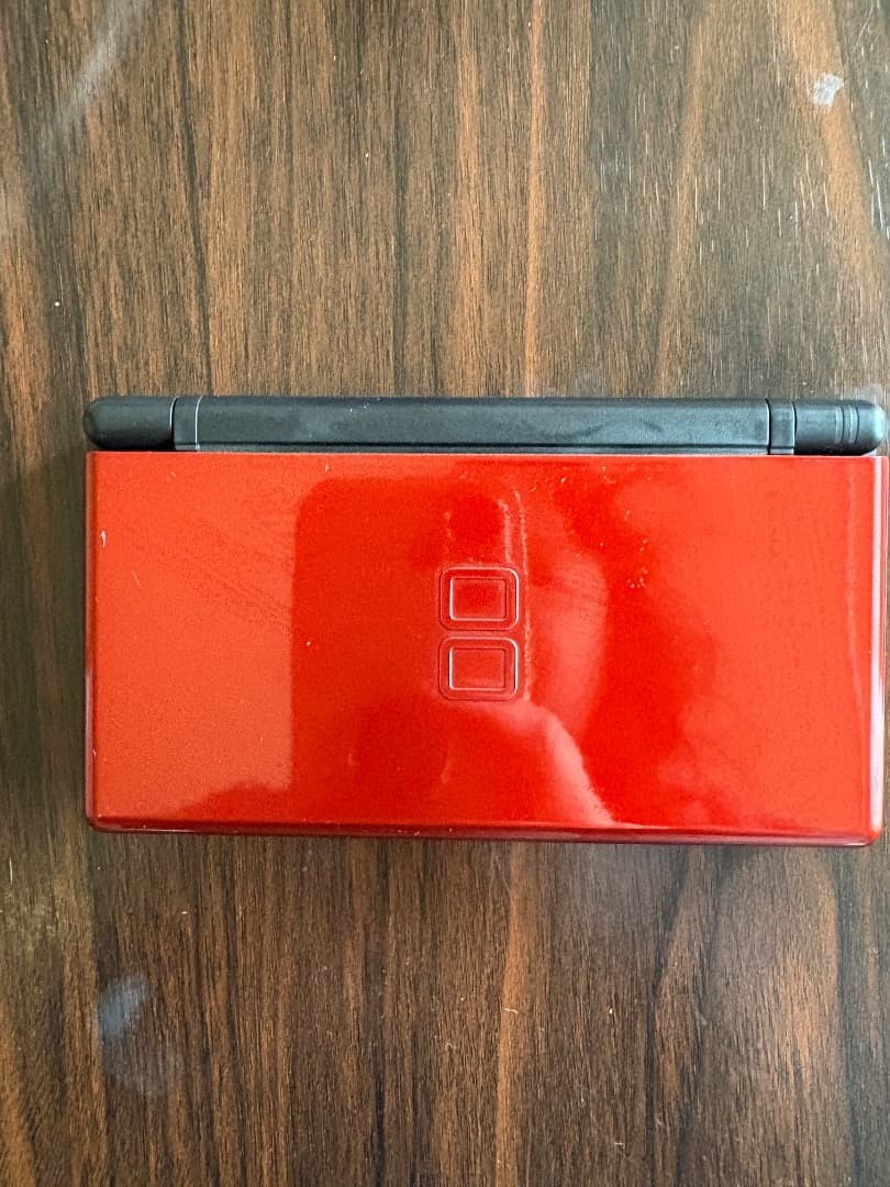 Nintendo DS Lite with two adult brain training Pict image games