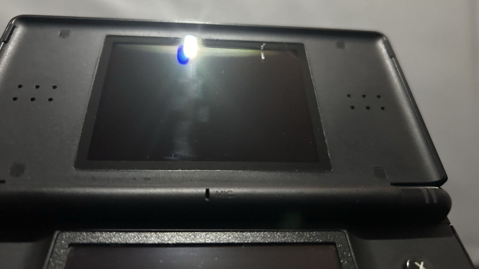 Nintendo DS Lite Handheld Console Black. No Charger. TESTED W/ Stylus/GBA Filler